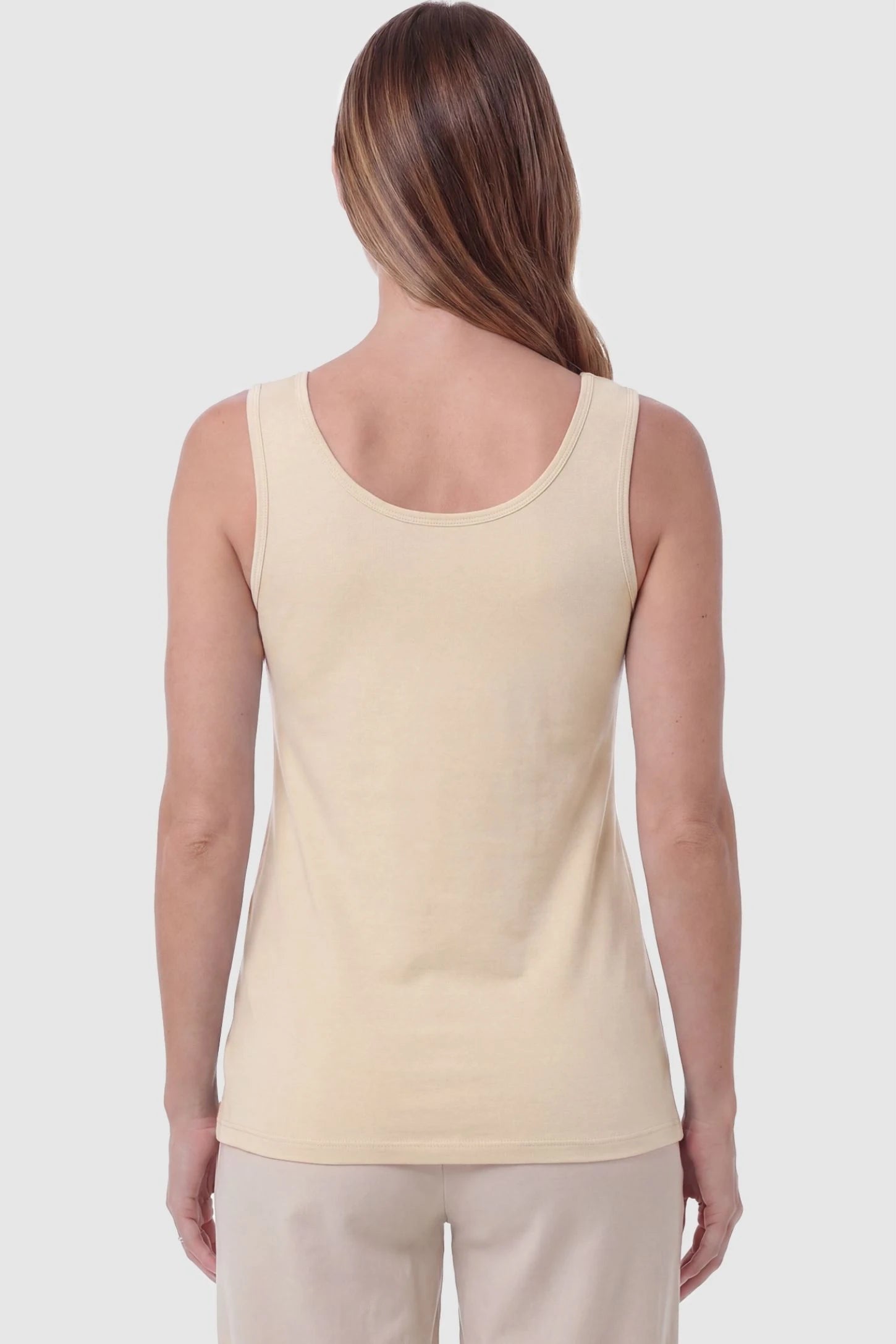 Soft Knit Sleeveless Maternity Tank Top Soft Knit Sleeveless Maternity Tank Top in Beige featuring a wide tank strap design on a pregnant model, back view.