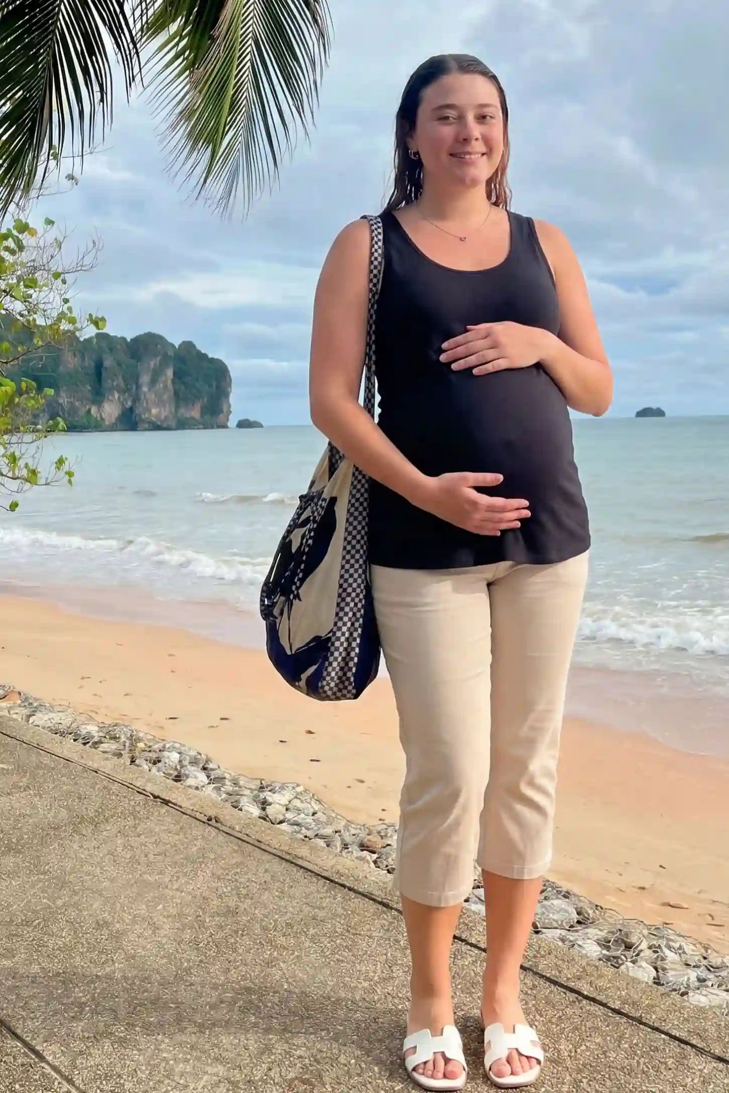 Soft Knit Sleeveless Maternity Tank Top Soft Knit Sleeveless Maternity Tank Top in Black featuring stretchy breathable fabric on a pregnant woman