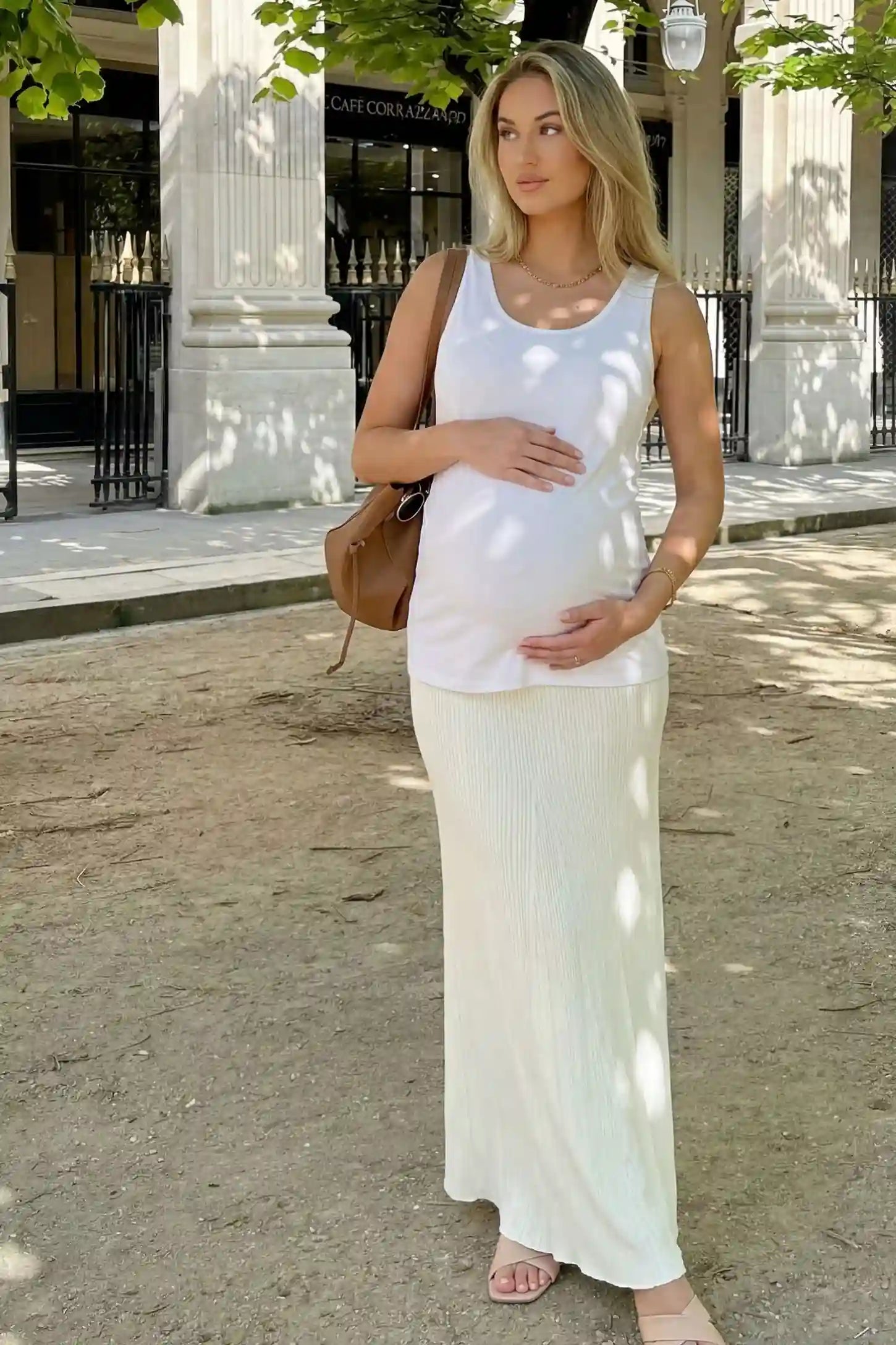 Soft Knit Sleeveless Maternity Tank Top Soft Knit Sleeveless Maternity Tank Top in White featuring a longline silhouette on a pregnant model