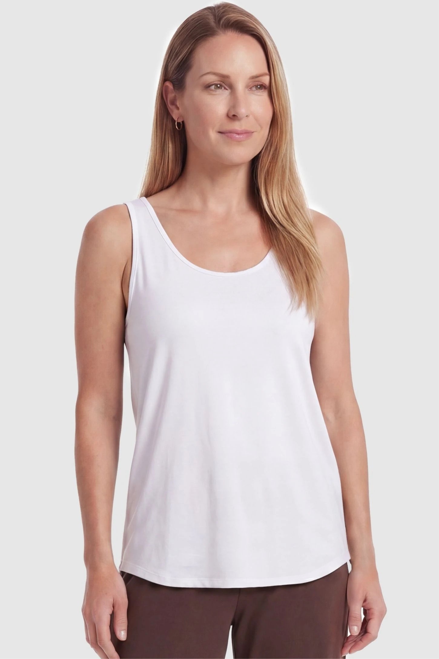 Soft Knit Sleeveless Maternity Tank Top Soft Knit Sleeveless Maternity Tank Top in White featuring a relaxed drape on a postpartum model, front view.