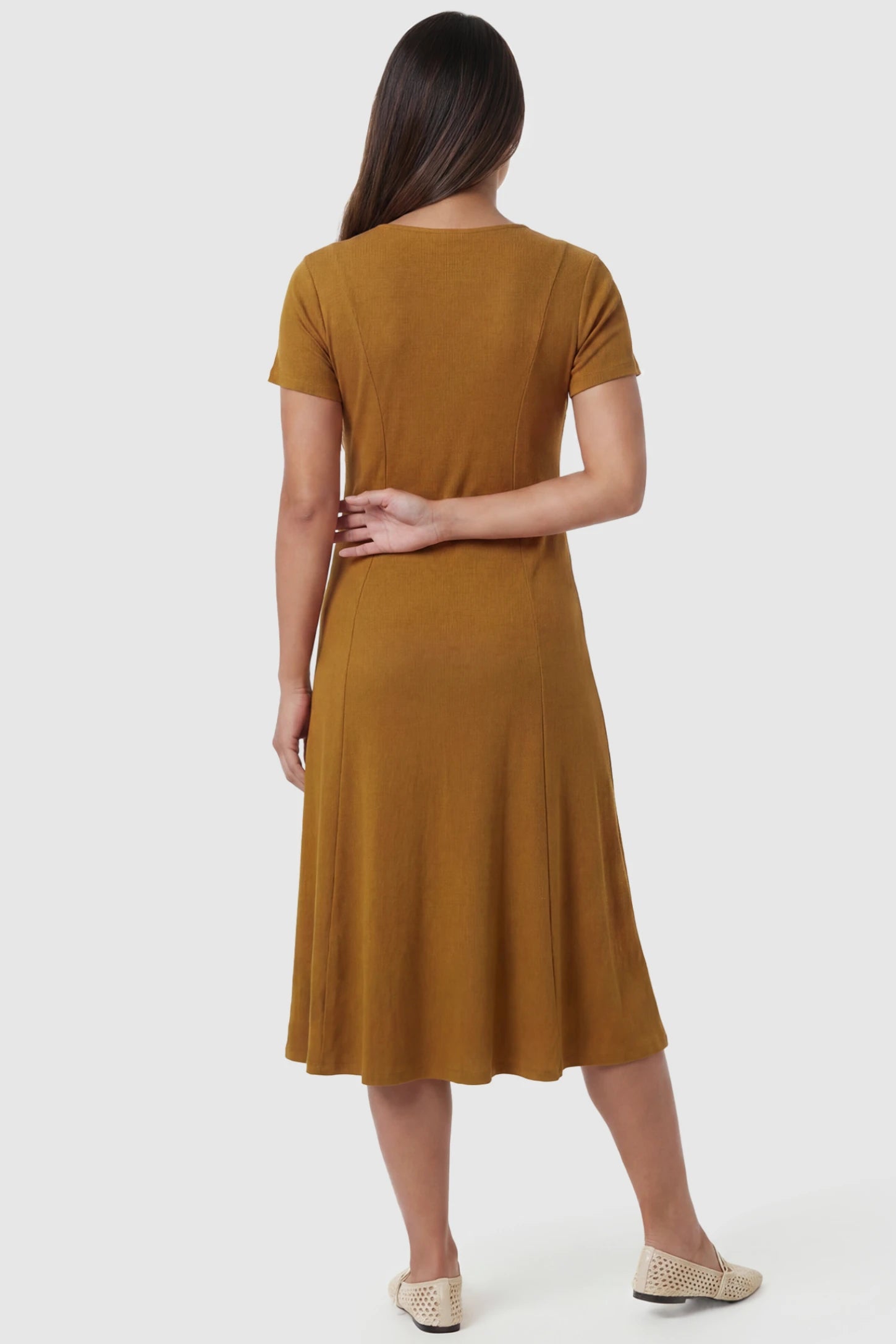 Soft Knit Stretch Short Sleeve Maternity Midi Dress Soft Knit Stretch Short Sleeve Maternity Midi Dress in Camel featuring high stretch knit on a pregnant model, back view.