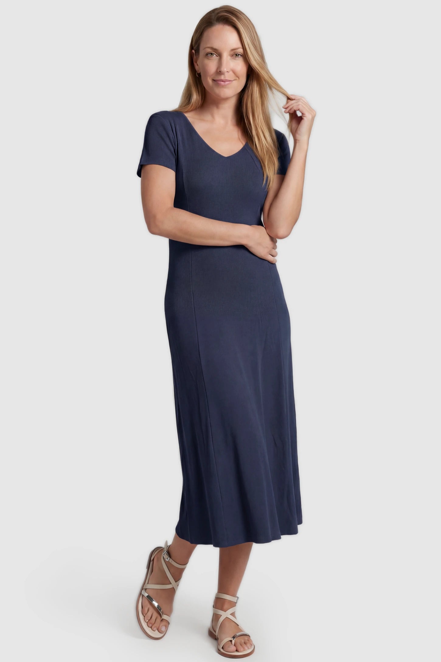 Soft Knit Stretch Short Sleeve Maternity Midi Dress Soft Knit Stretch Short Sleeve Maternity Midi Dress in Dark Gray featuring a flattering v-neck and high stretch knit on a postpartum model, front view.