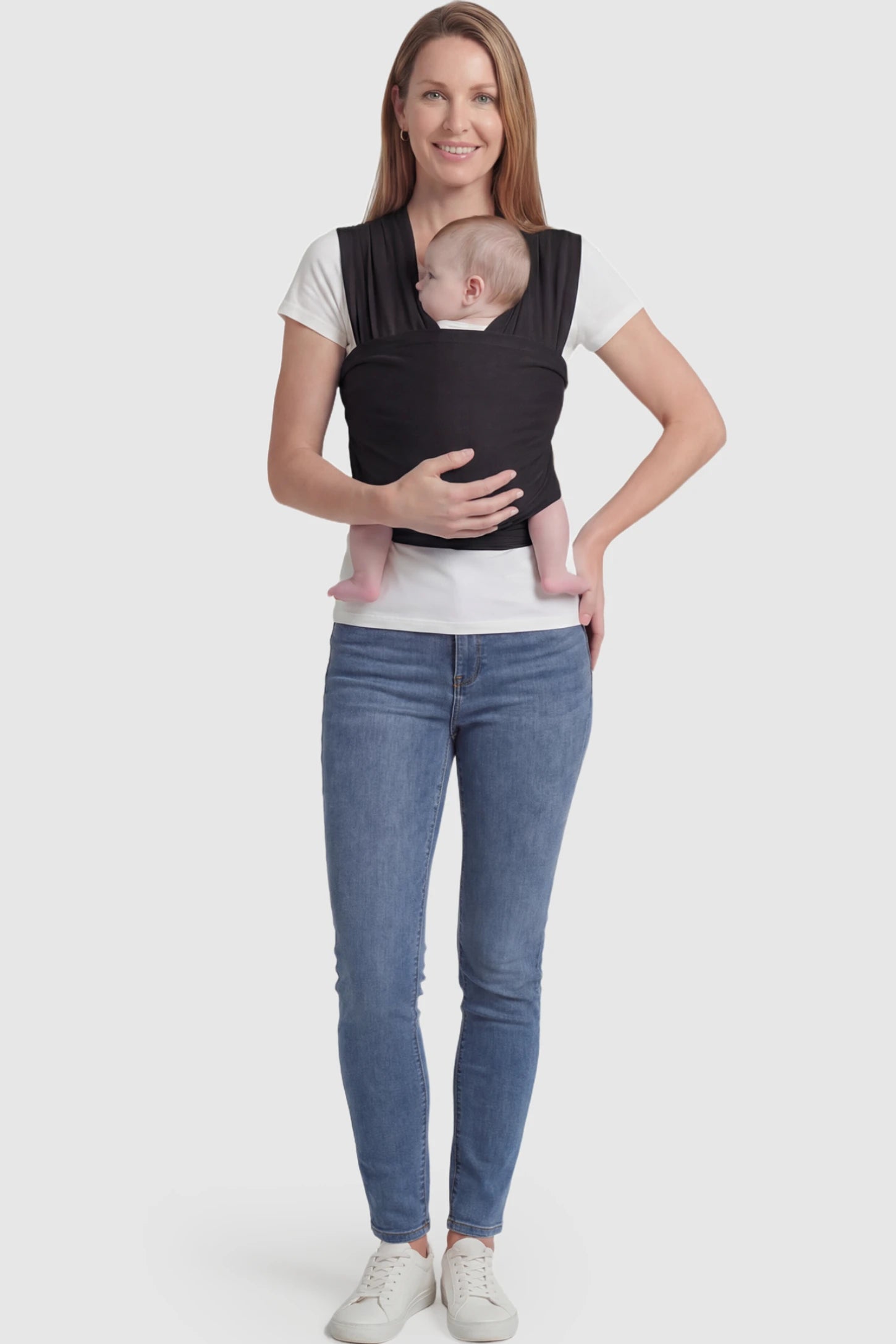 Soft Stretch Adjustable Baby Wrap Carrier Soft Stretch Adjustable Baby Wrap Carrier in Black featuring a polyester blend holding a baby.