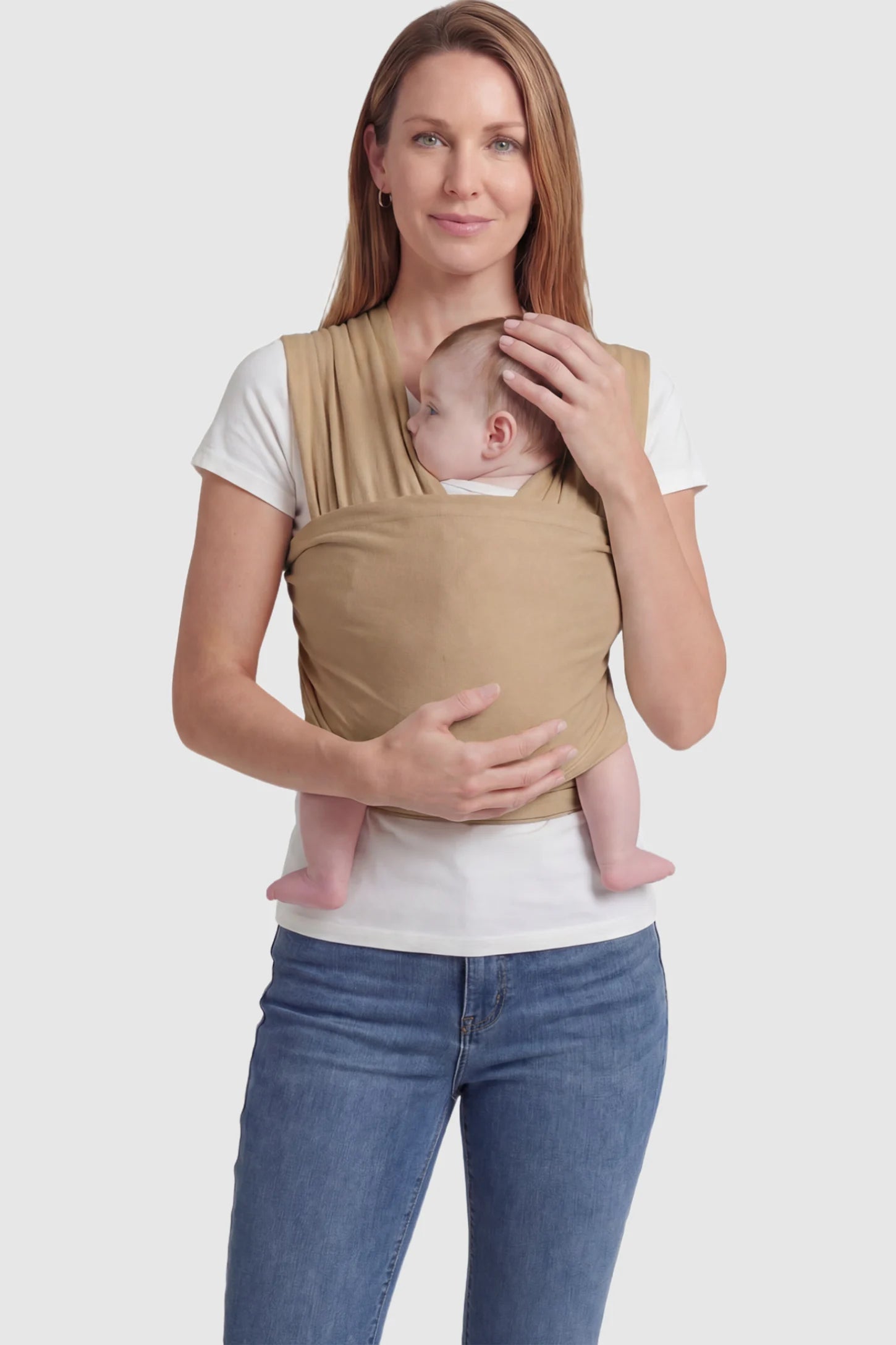 Soft Stretch Adjustable Baby Wrap Carrier Soft Stretch Adjustable Baby Wrap Carrier in Coffee featuring a polyester blend holding a baby.