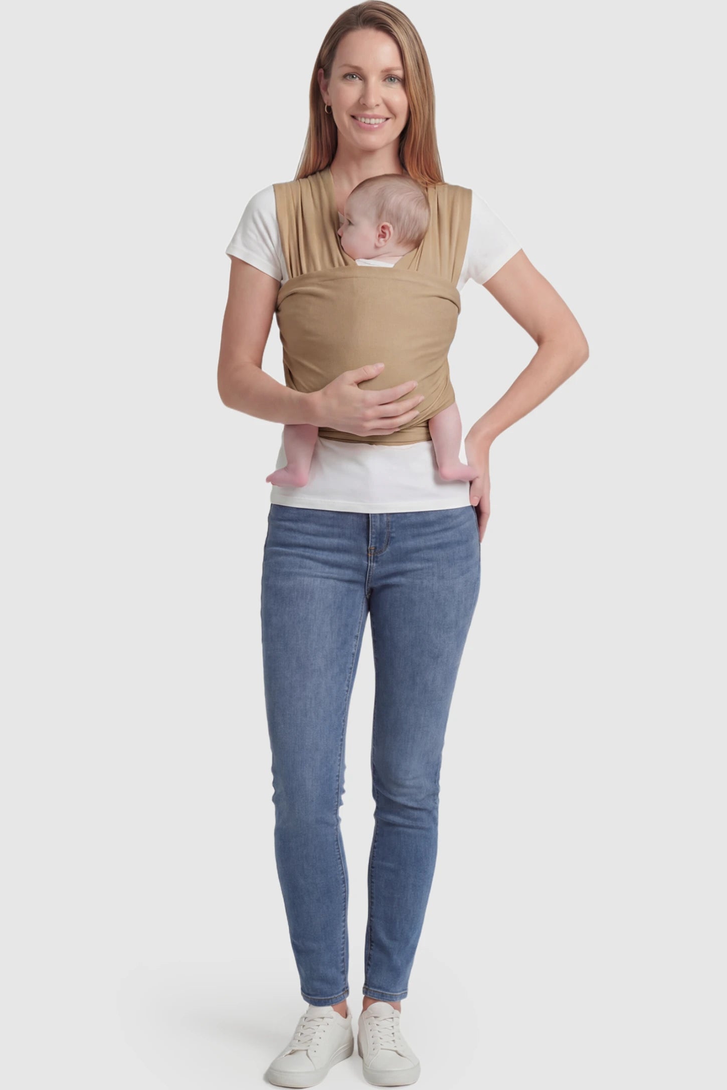 Soft Stretch Adjustable Baby Wrap Carrier Soft Stretch Adjustable Baby Wrap Carrier in Coffee featuring a polyester blend holding a baby.