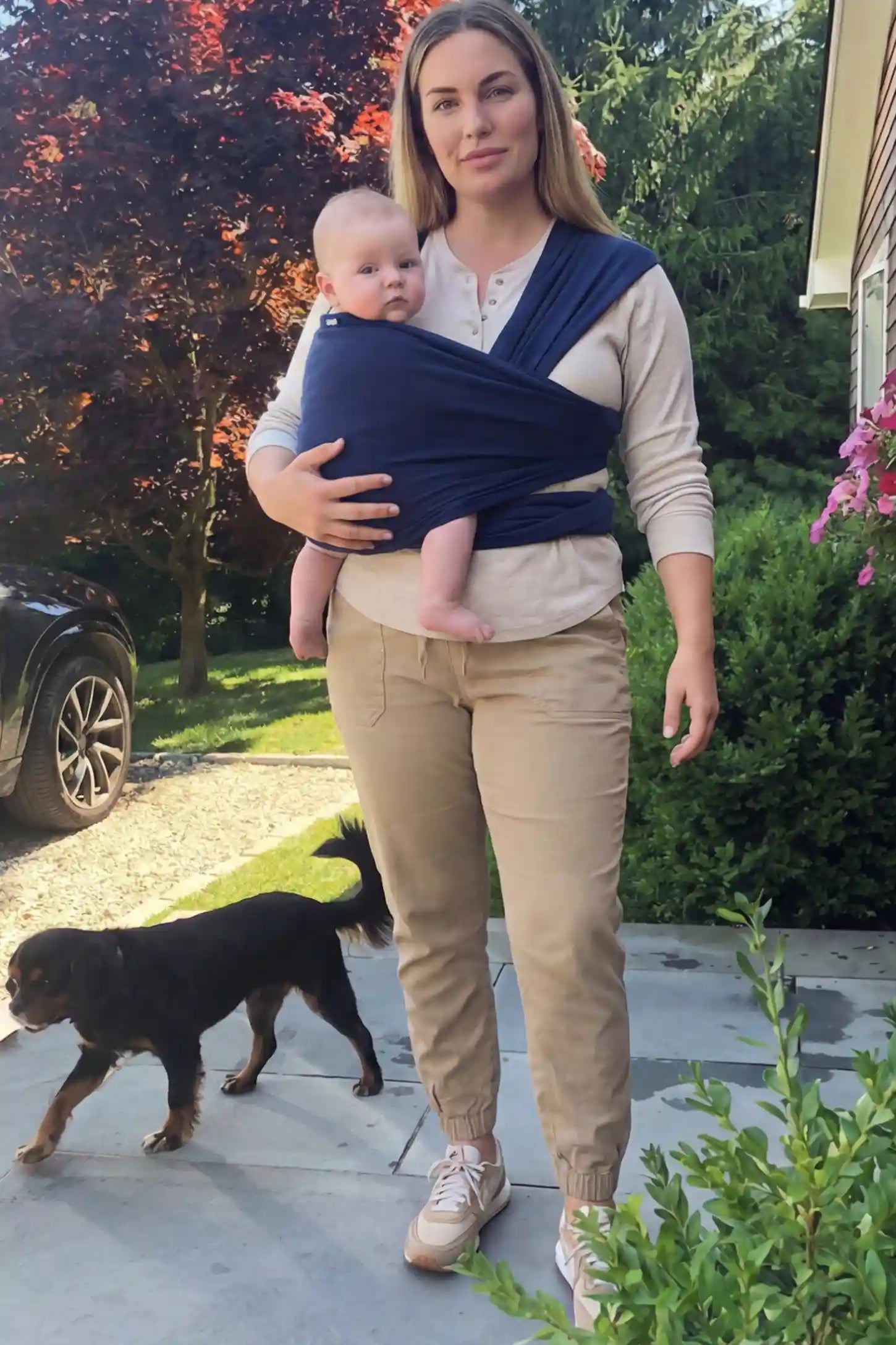 Soft Stretch Adjustable Baby Wrap Carrier Soft Stretch Adjustable Baby Wrap Carrier in Dark Blue featuring a polyester blend holding a baby.
