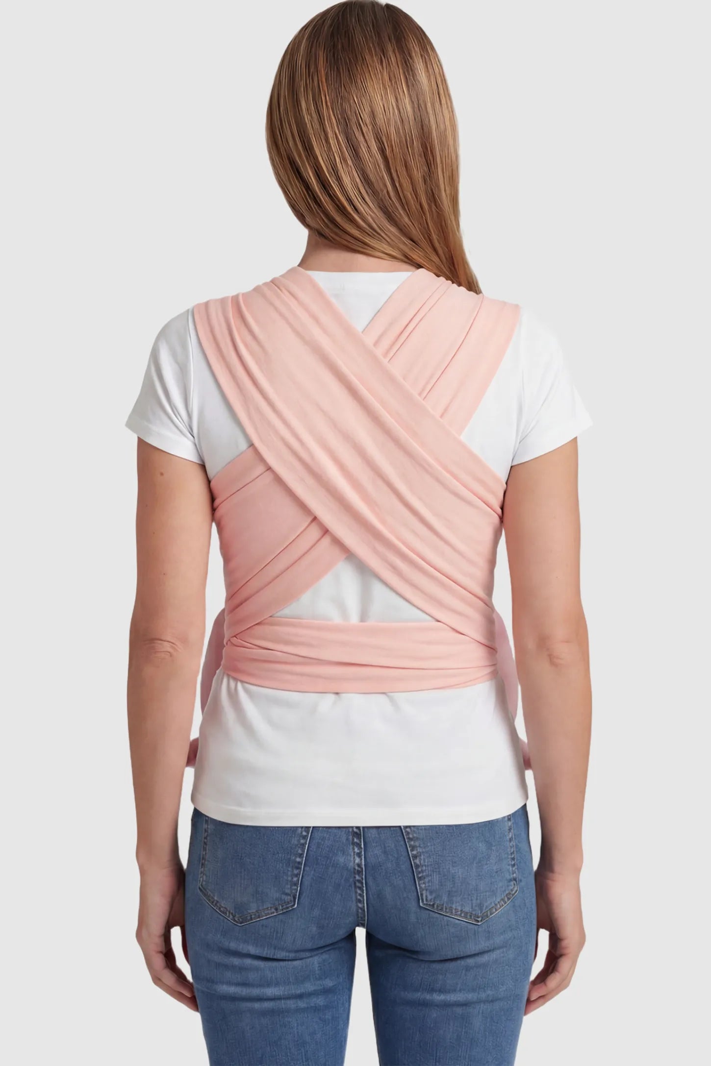 Soft Stretch Adjustable Baby Wrap Carrier Soft Stretch Adjustable Baby Wrap Carrier in Lotus Root Pink featuring a polyester blend on a model.