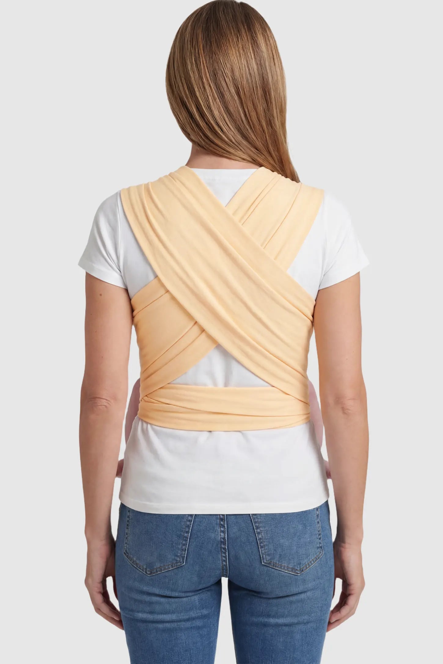 Soft Stretch Adjustable Baby Wrap Carrier Soft Stretch Adjustable Baby Wrap Carrier in pale Yellow featuring a polyester blend holding a baby.