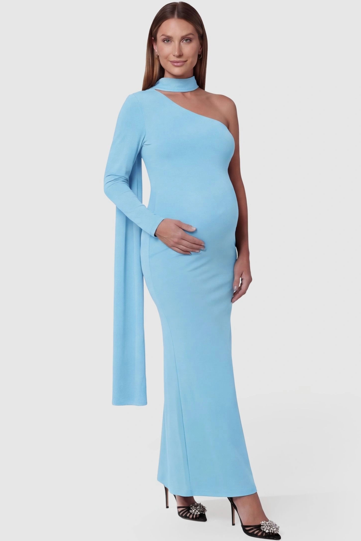 Soft Stretch One-Sleeve Halter Maternity Dress Soft Stretch One-Sleeve Halter Maternity Dress in Blue featuring a sleek floor-length hem on a pregnant model front view.