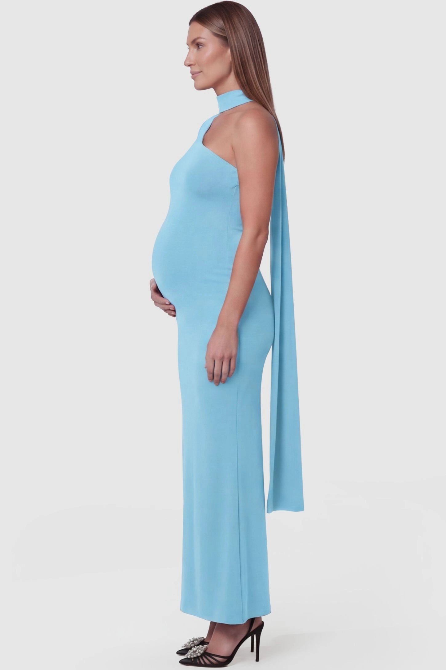 Soft Stretch One-Sleeve Halter Maternity Dress Blue Soft Stretch One-Sleeve Halter Maternity Dress featuring a draped shoulder detail on a pregnant model side view.