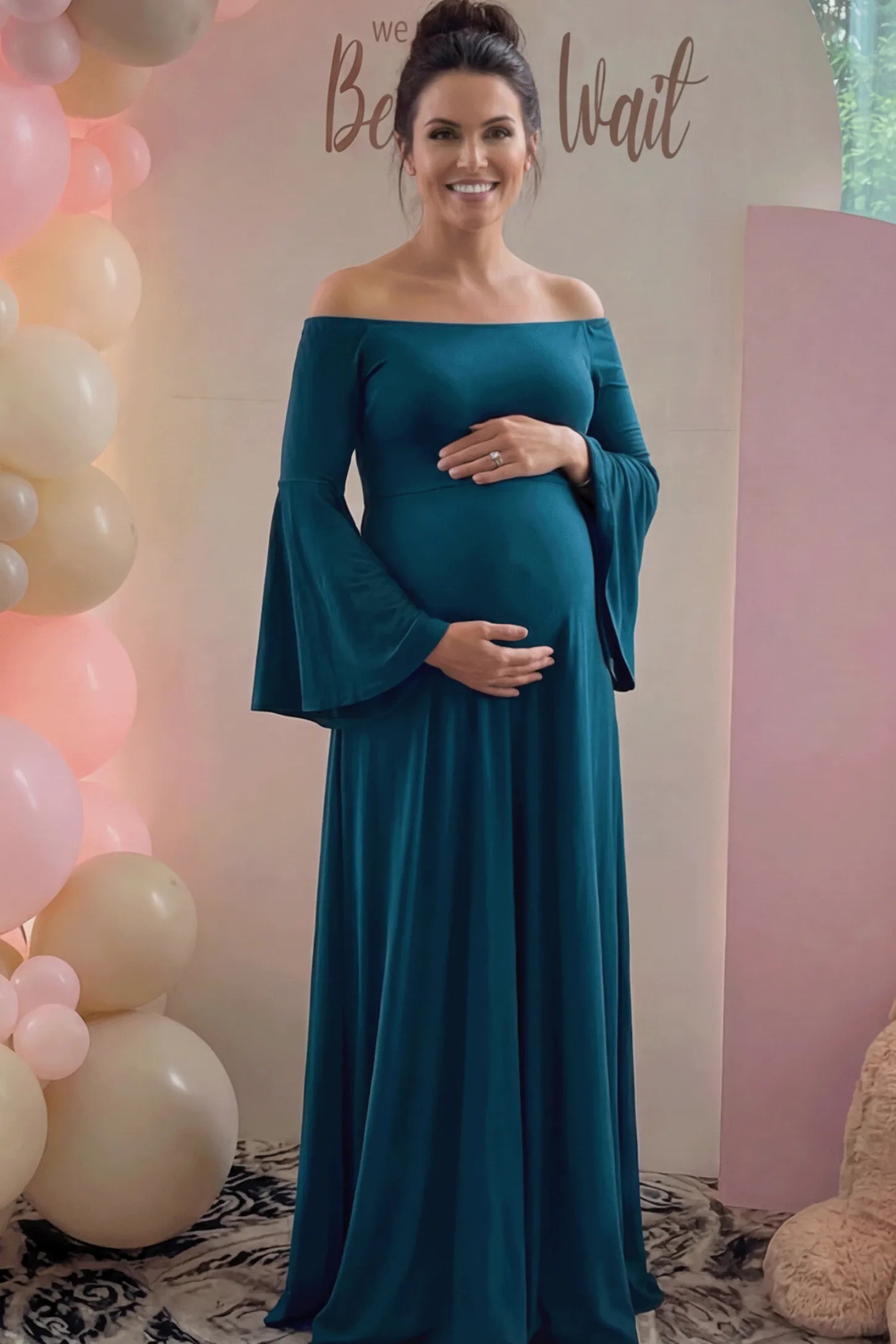 Solid Off Shoulder Bell Sleeve Maternity Maxi Dress Solid Off Shoulder Bell Sleeve Maternity Maxi Dress in Navy Blue featuring Bell sleeves on a pregnant model showing front.