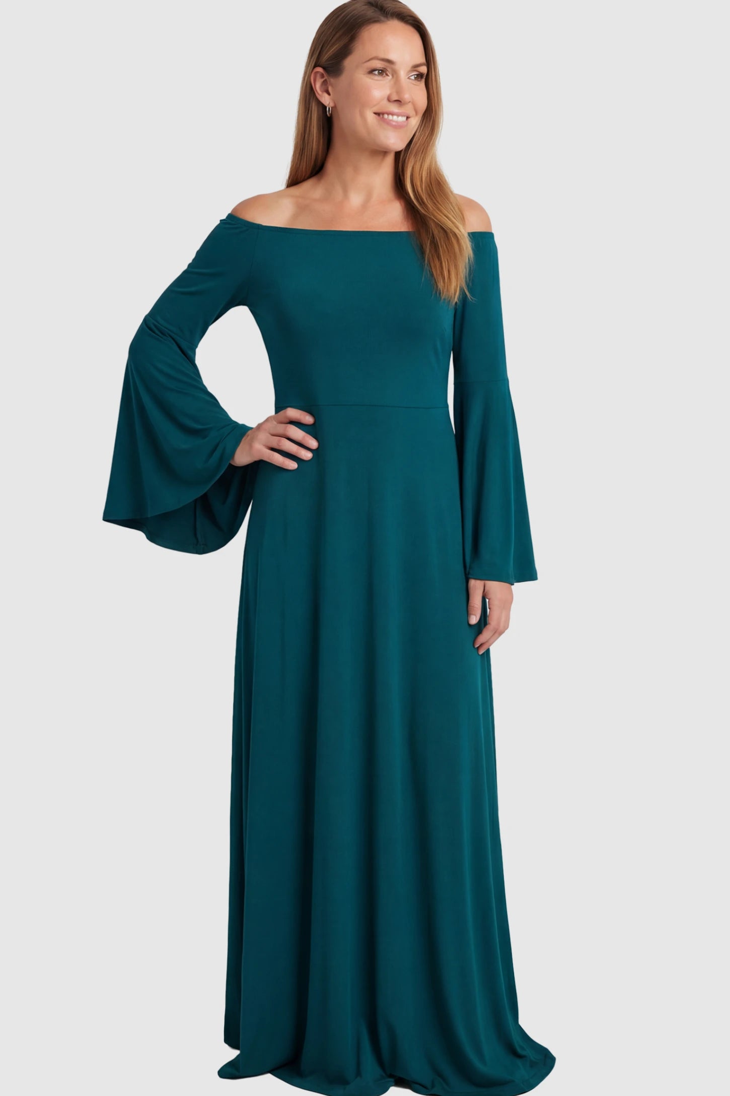 Solid Off Shoulder Bell Sleeve Maternity Maxi Dress Solid Off Shoulder Bell Sleeve Maternity Maxi Dress in Navy Blue featuring Bell sleeves on a postpartum model showing front.