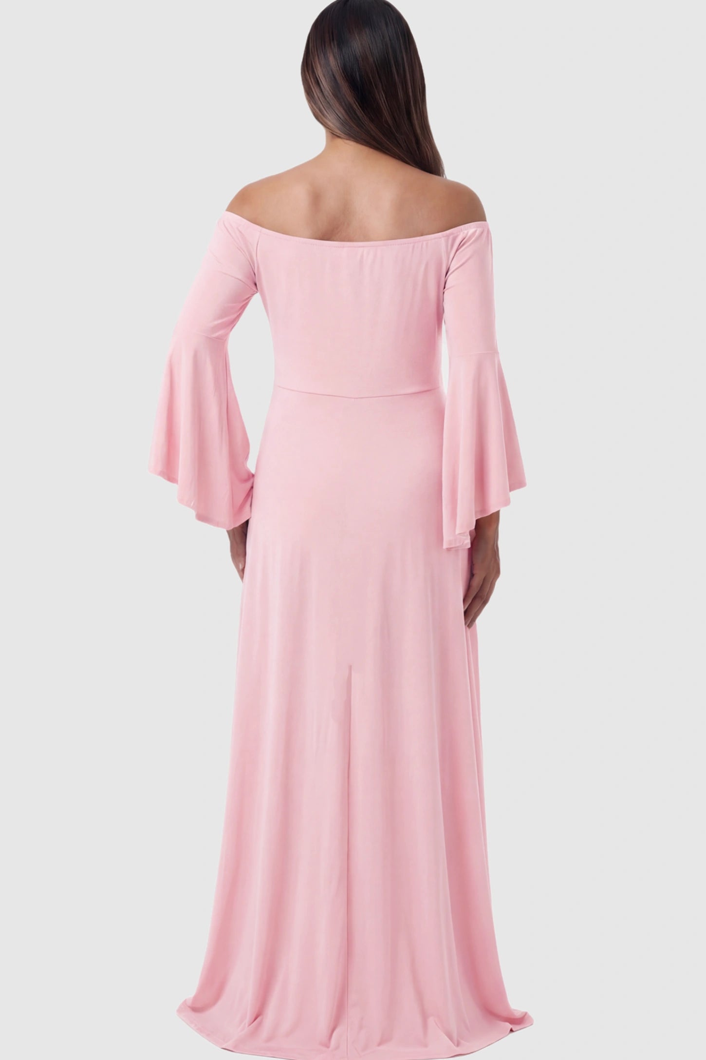 Solid Off Shoulder Bell Sleeve Maternity Maxi Dress Solid Off Shoulder Bell Sleeve Maternity Maxi Dress in Pink featuring bell sleeves on a pregnant model showing back.