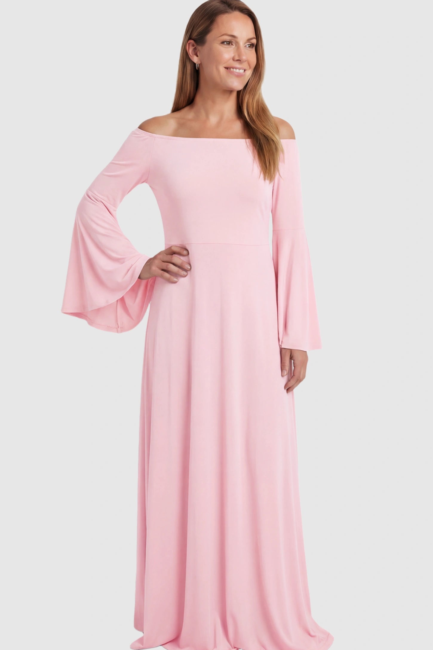 Solid Off Shoulder Bell Sleeve Maternity Maxi Dress Solid Off Shoulder Bell Sleeve Maternity Maxi Dress in Pink featuring Bell sleeves on a postpartum model showing front.