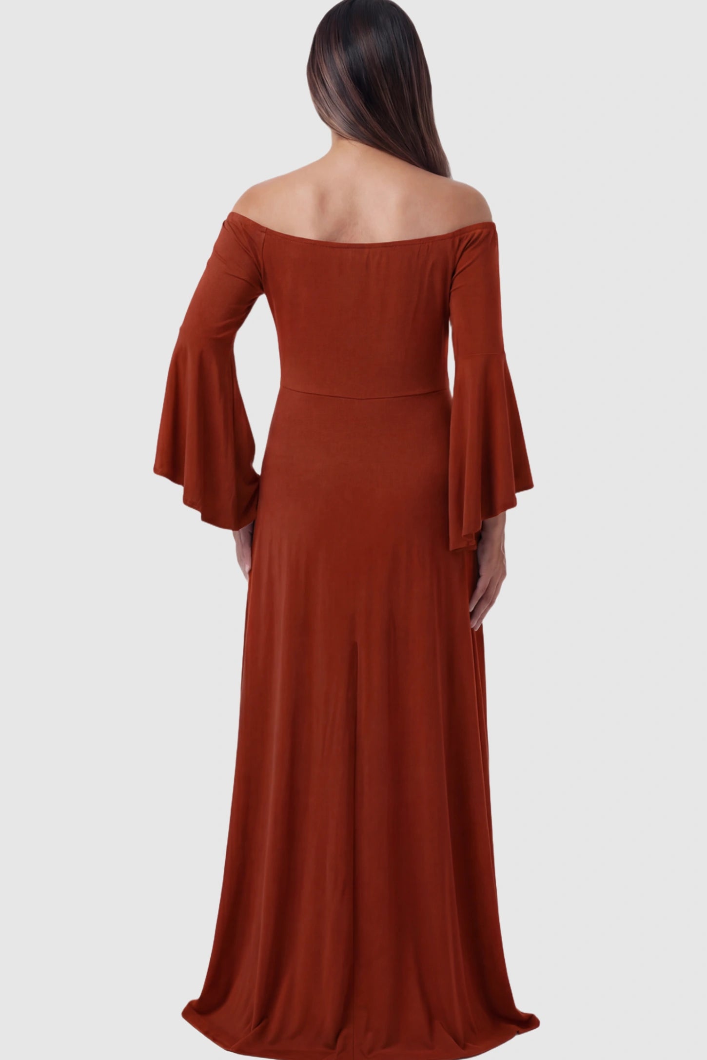 Solid Off Shoulder Bell Sleeve Maternity Maxi Dress Solid Off Shoulder Bell Sleeve Maternity Maxi Dress in Red featuring bell sleeves on a pregnant model showing back.