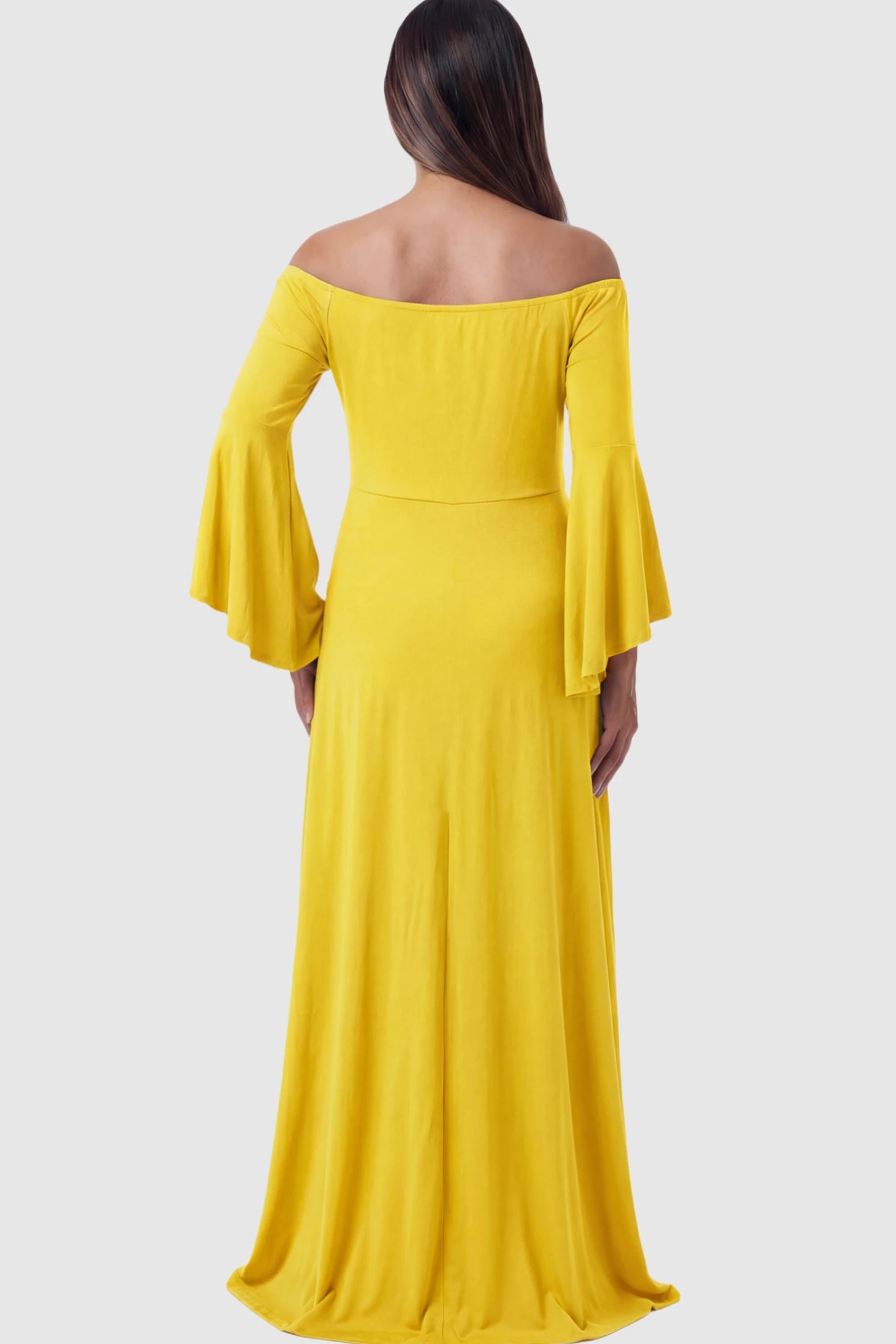 Solid Off Shoulder Bell Sleeve Maternity Maxi Dress Solid Off Shoulder Bell Sleeve Maternity Maxi Dress in Yellow featuring bell sleeves on a pregnant model showing back.