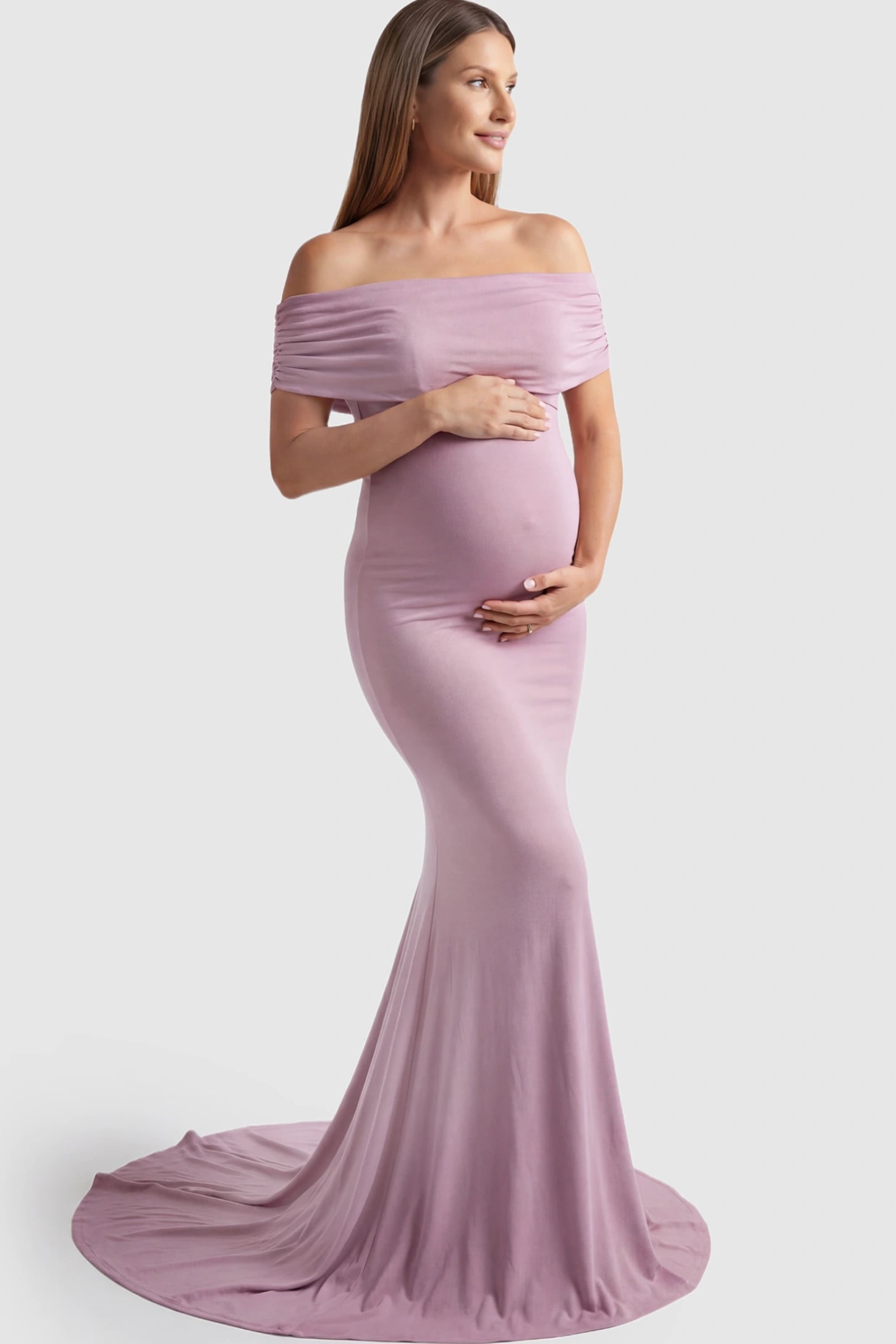 Solid Off-Shoulder Maternity Photoshoot Gown in Pink featuring subtle train on a pregnant model showing front.