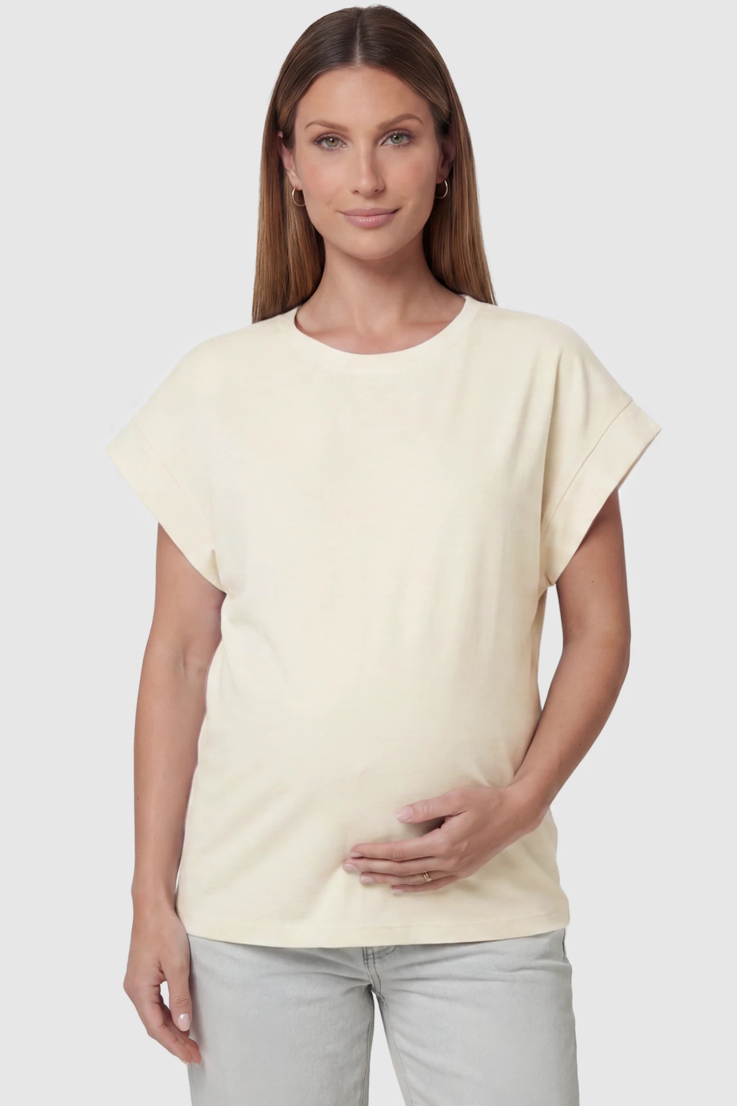 Solid Round Neck Cap Sleeve Maternity Top Solid Round Neck Cap Sleeve Maternity Top in Beige featuring breathable fabric on a pregnant model, front view.
