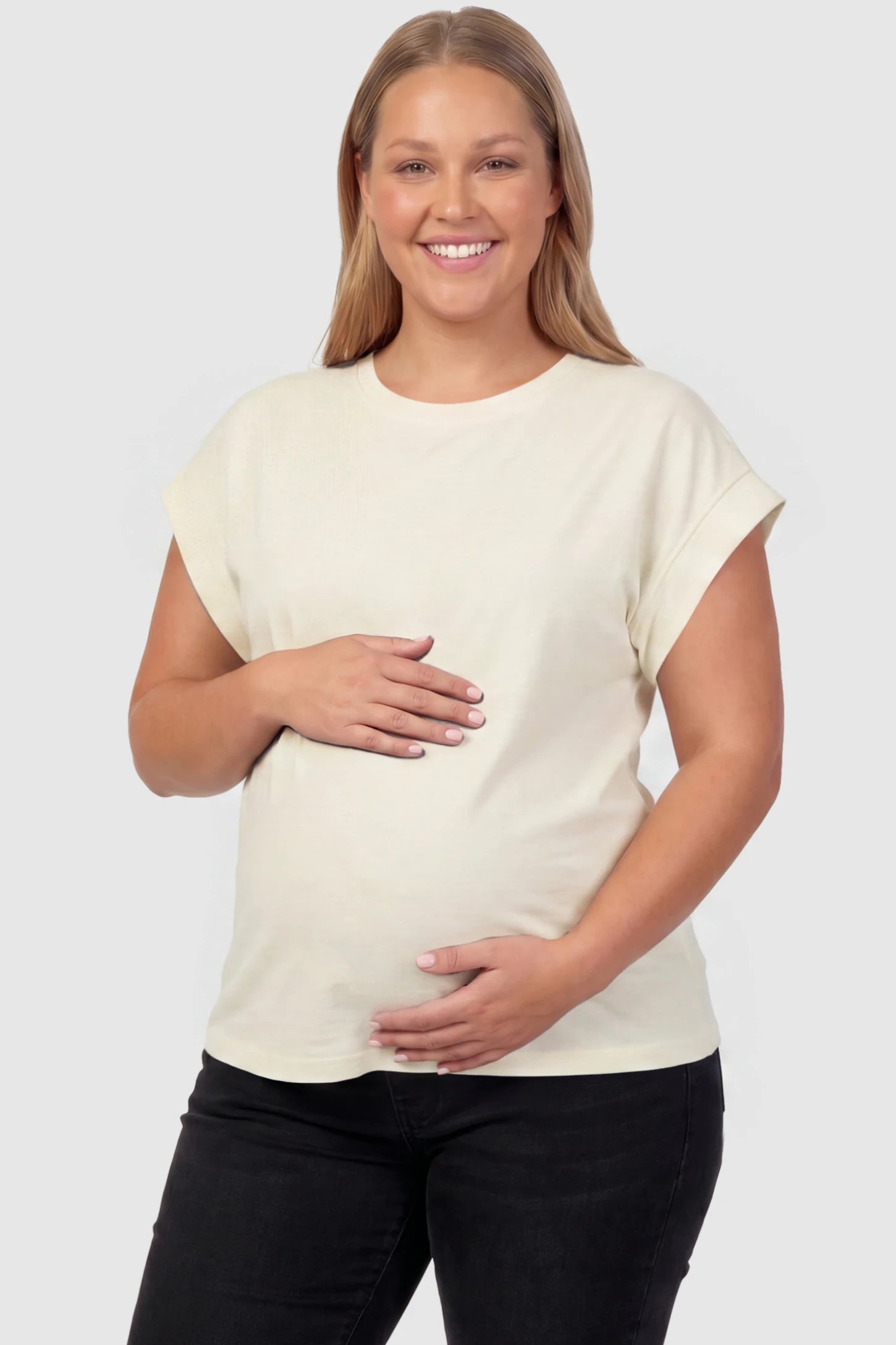 Solid Round Neck Cap Sleeve Maternity Top Solid Round Neck Cap Sleeve Maternity Top in Beige featuring breathable fabric on a plus size pregnant model, front view.