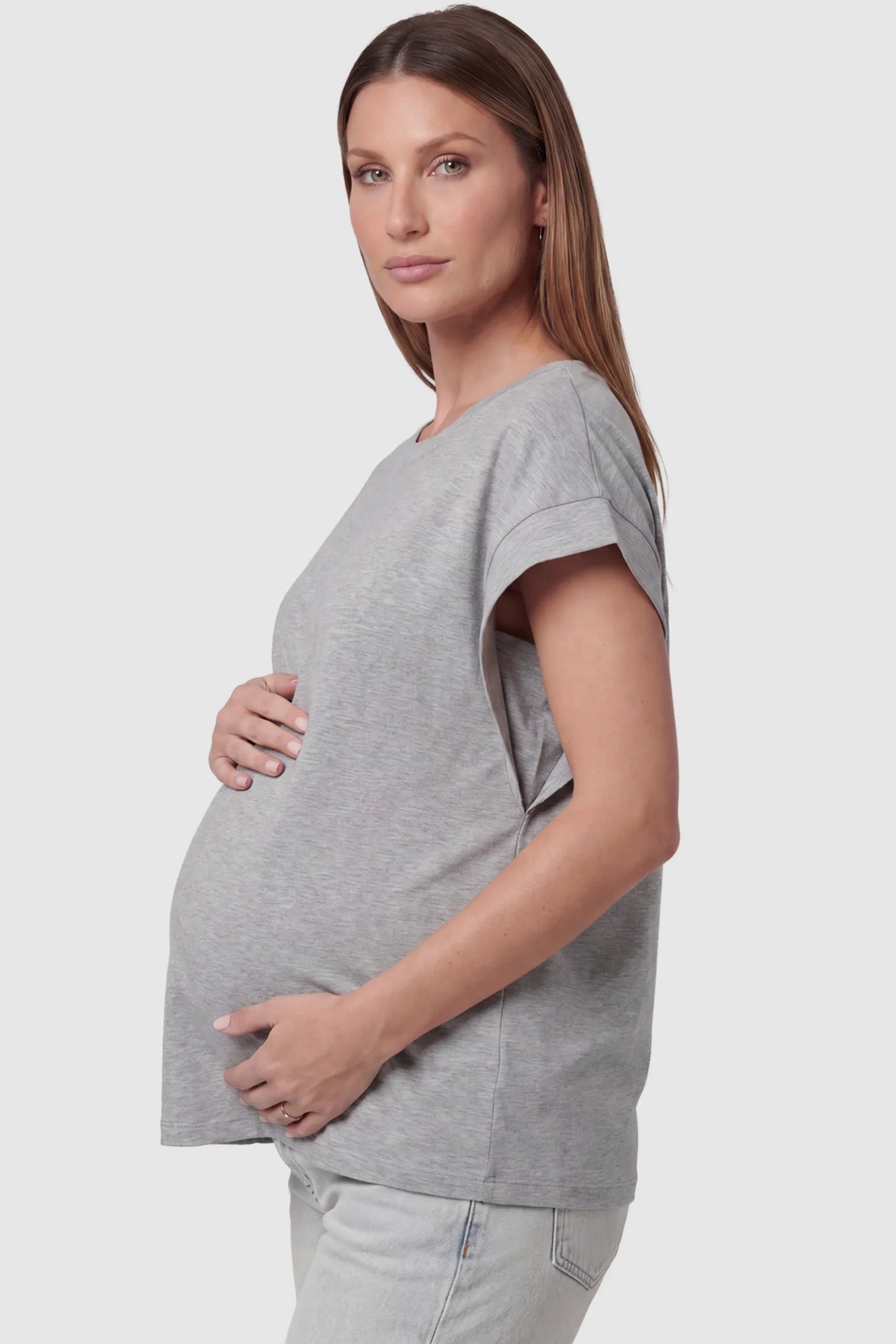 Solid Round Neck Cap Sleeve Maternity Top in Light Gray featuring breathable fabric on a pregnant model, side view.