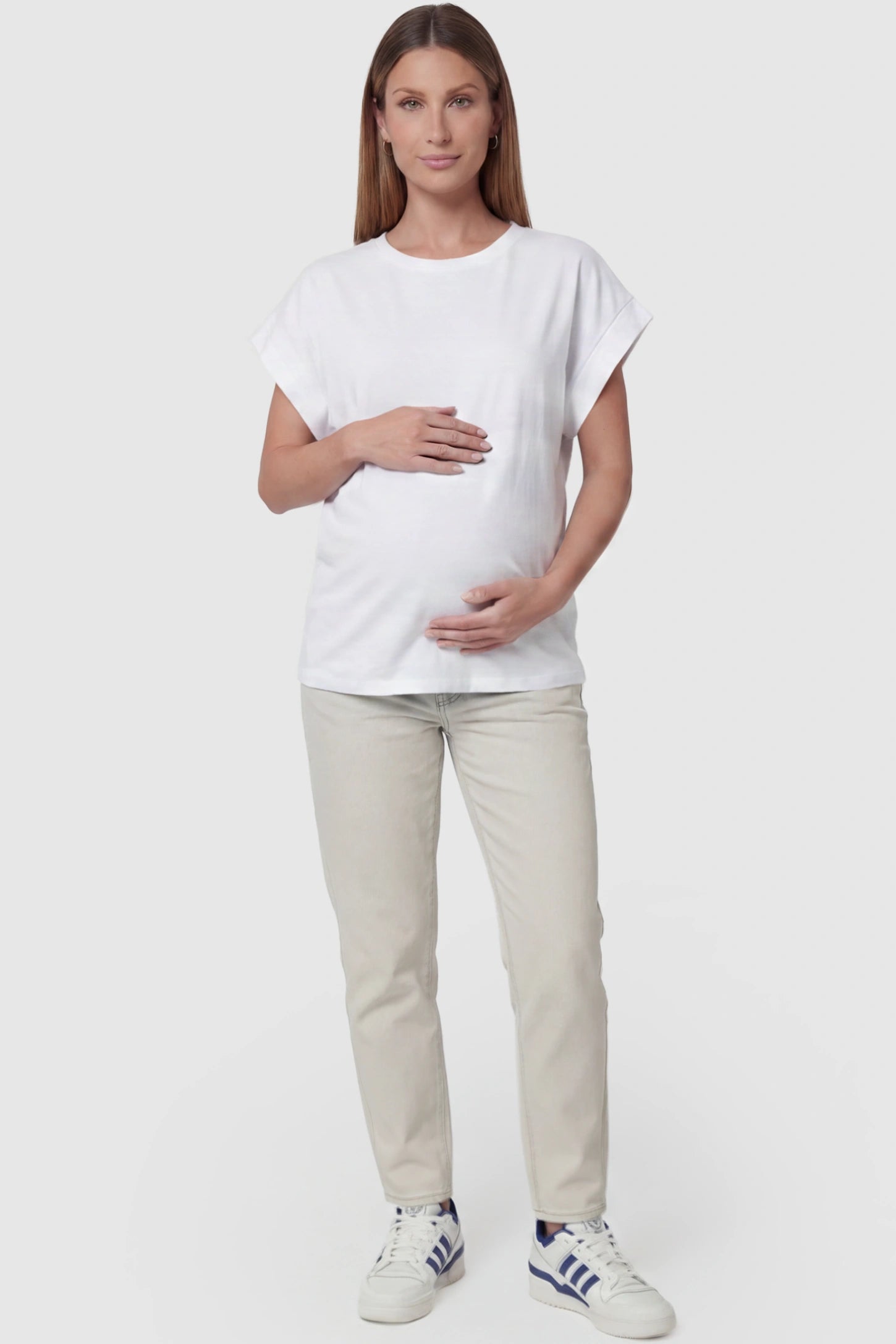 Solid Round Neck Cap Sleeve Maternity Top Solid Round Neck Cap Sleeve Maternity Top in White featuring breathable fabric on a pregnant model, full body view.