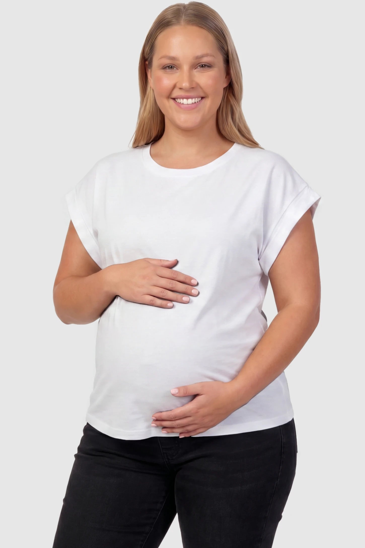 Solid Round Neck Cap Sleeve Maternity Top Solid Round Neck Cap Sleeve Maternity Top in White featuring breathable fabric on a plus size pregnant model, front view.