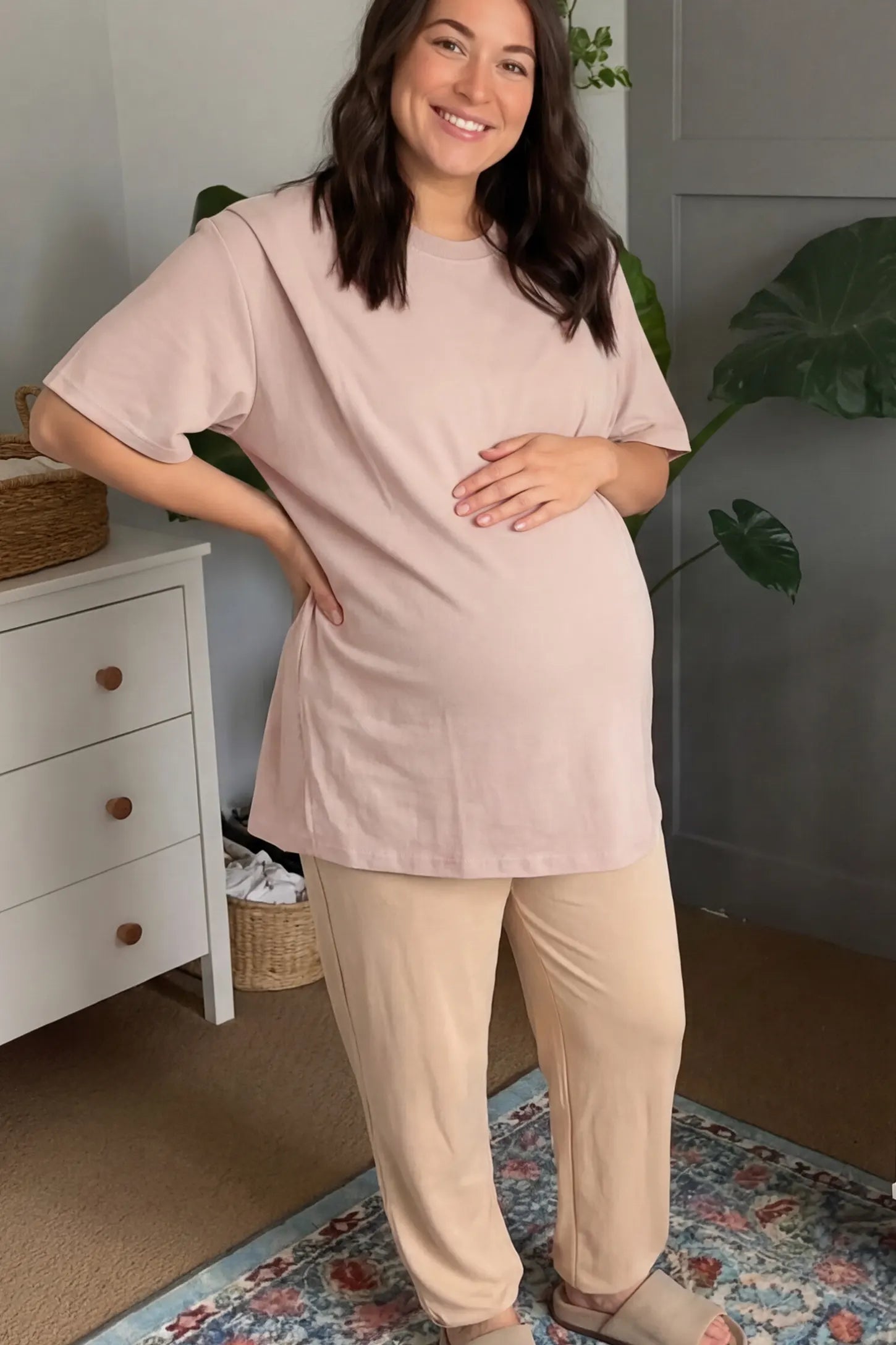 Solid Round Neck Short Sleeve Maternity Top Solid Round Neck Short Sleeve Maternity Top in Brown featuring a soft-touch finish and relaxed fit on a pregnant model in indoor setting, front view.