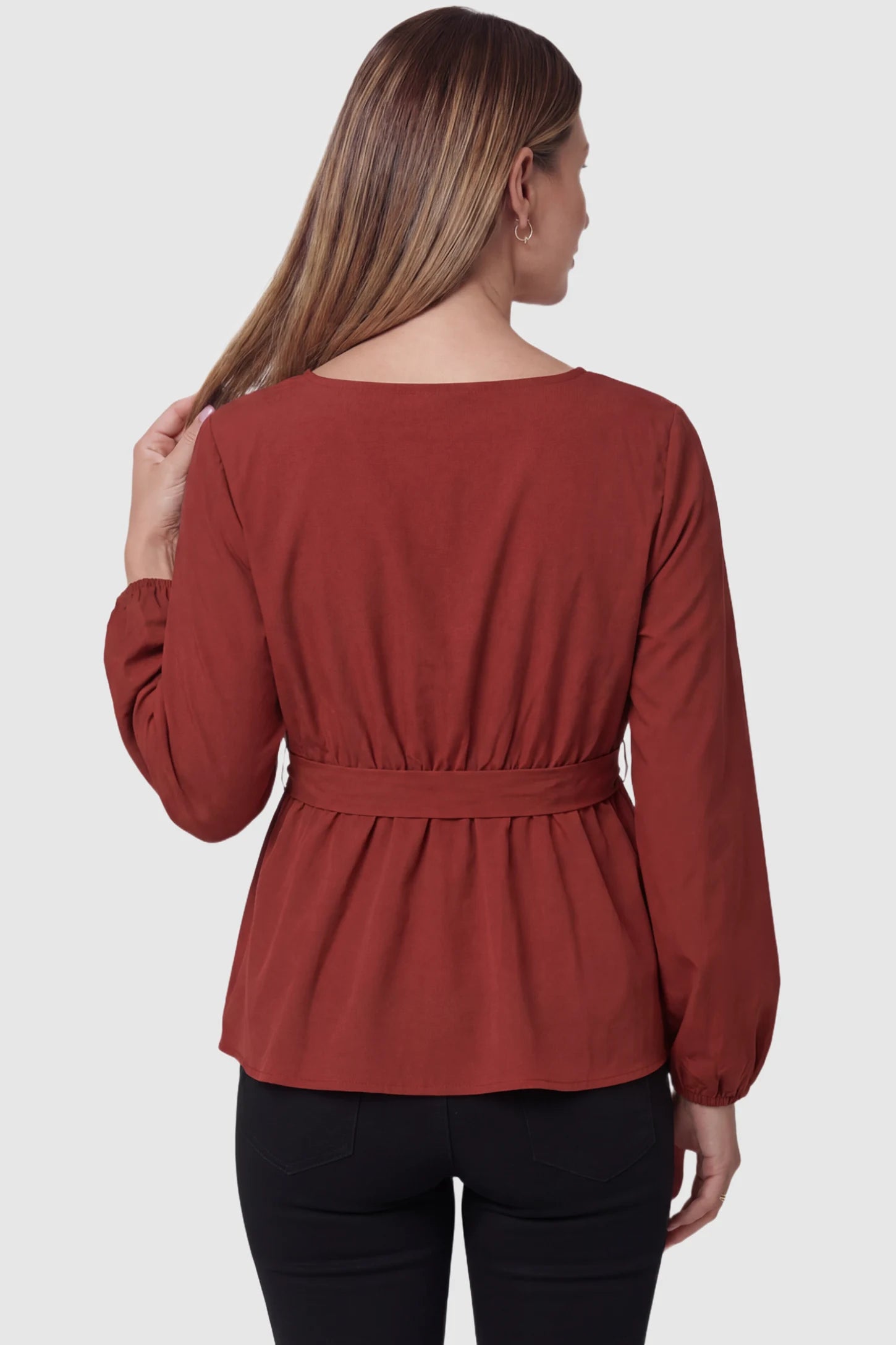 Solid Square Neck Empire Waist Maternity Top Solid Square Neck Empire Waist Maternity Top in burgundy featuring long sleeves and elasticated waist on a pregnant model back view.