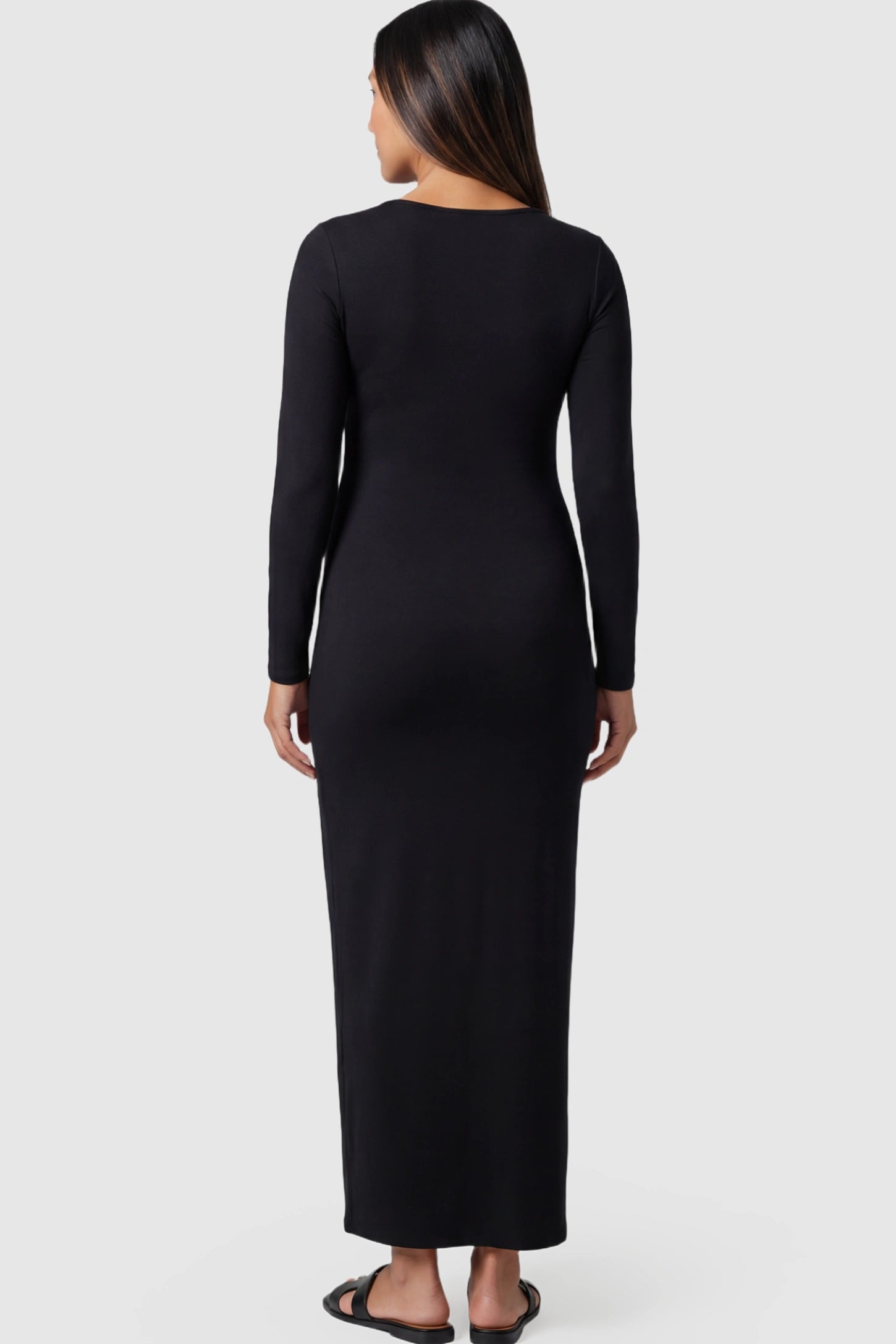 Solid Square Neck Long Sleeve Bodycon Maternity Maxi Dress Solid Square Neck Long Sleeve Bodycon Maternity Maxi Dress in Black featuring a bodycon fit on a pregnant model showing back.