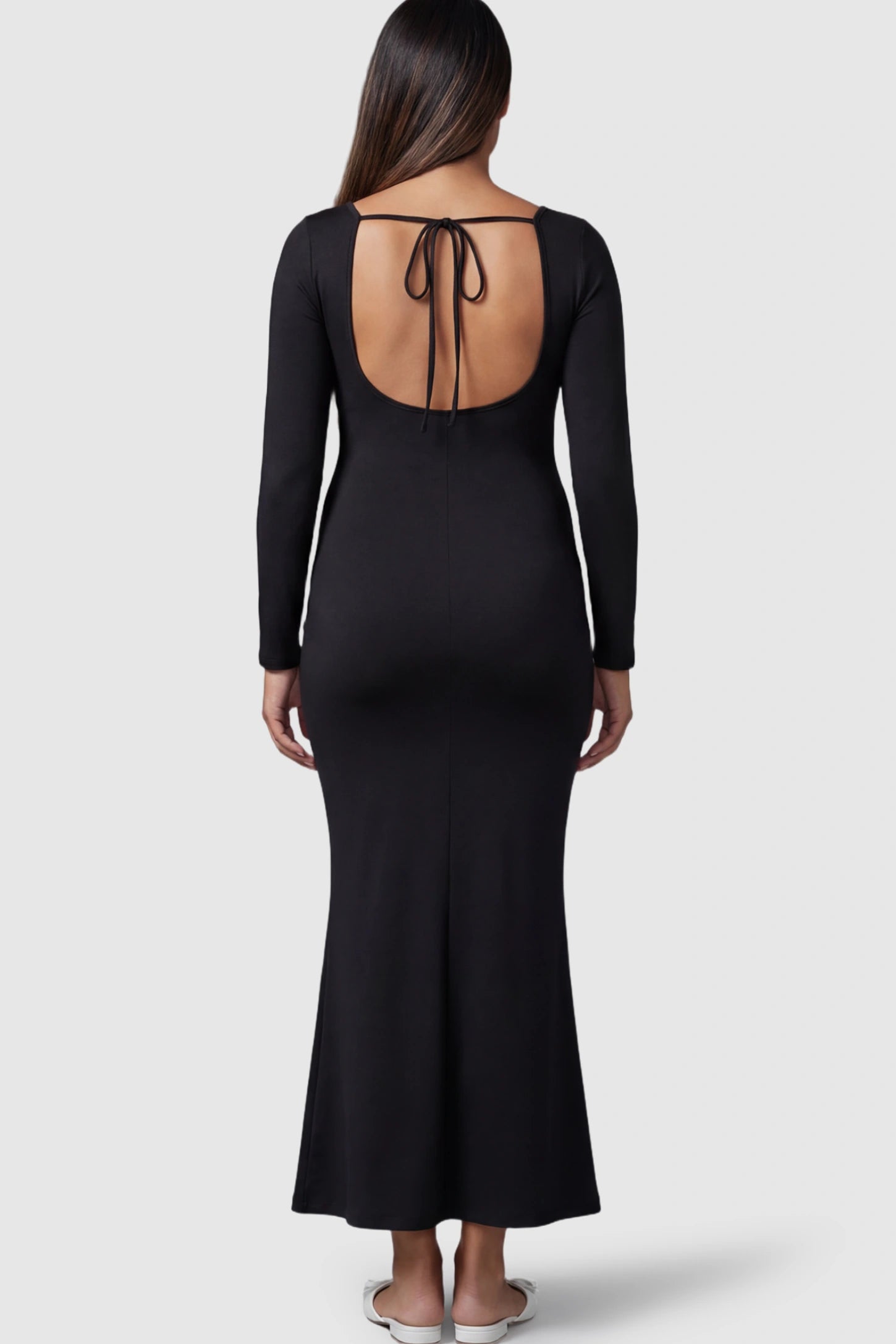 Solid Square Neck Long Sleeve Maternity Maxi Dress Solid Square Neck Long Sleeve Maternity Maxi Dress in black featuring a self-tie open back detail on a model showing back.
