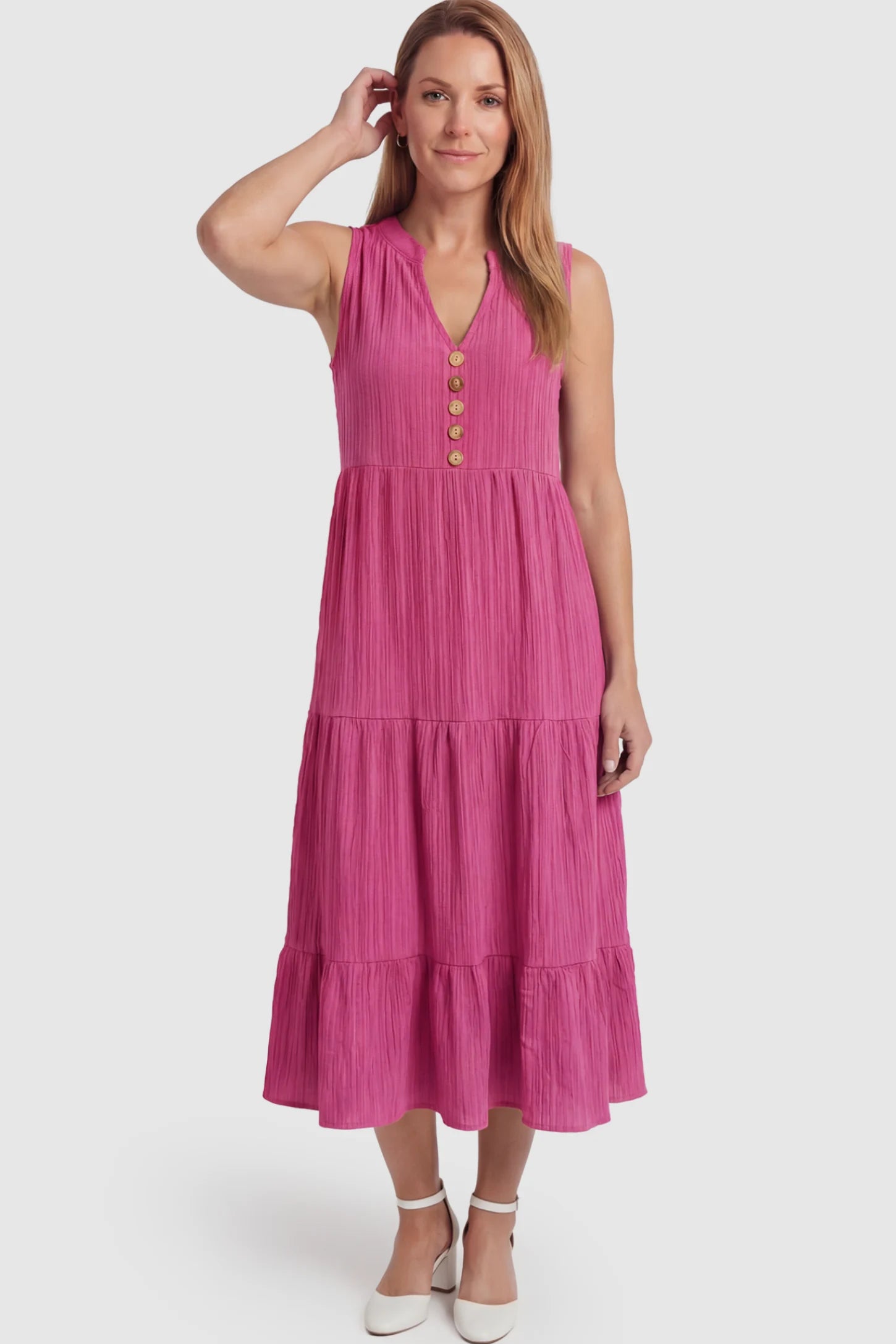 Solid Textured V-Neck Tiered Maternity Midi Dress Solid Textured V-Neck Tiered Maternity Midi Dress in Rose Red featuring a high-waisted A-line silhouette on a postpartum model.