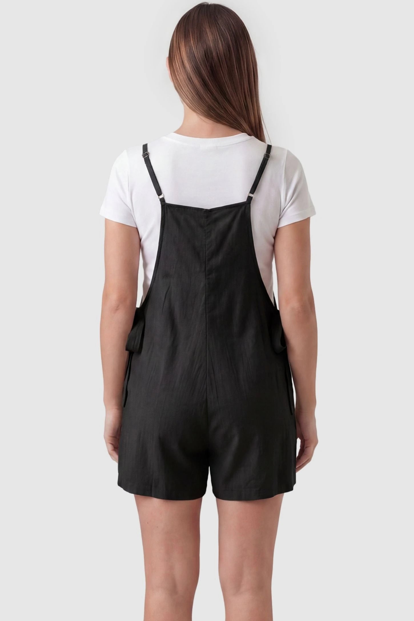Spaghetti Strap Tie-Side Maternity Romper Rear view of Black Spaghetti Strap Tie-Side Maternity Romper highlighting the simple high-back design on a pregnant model.