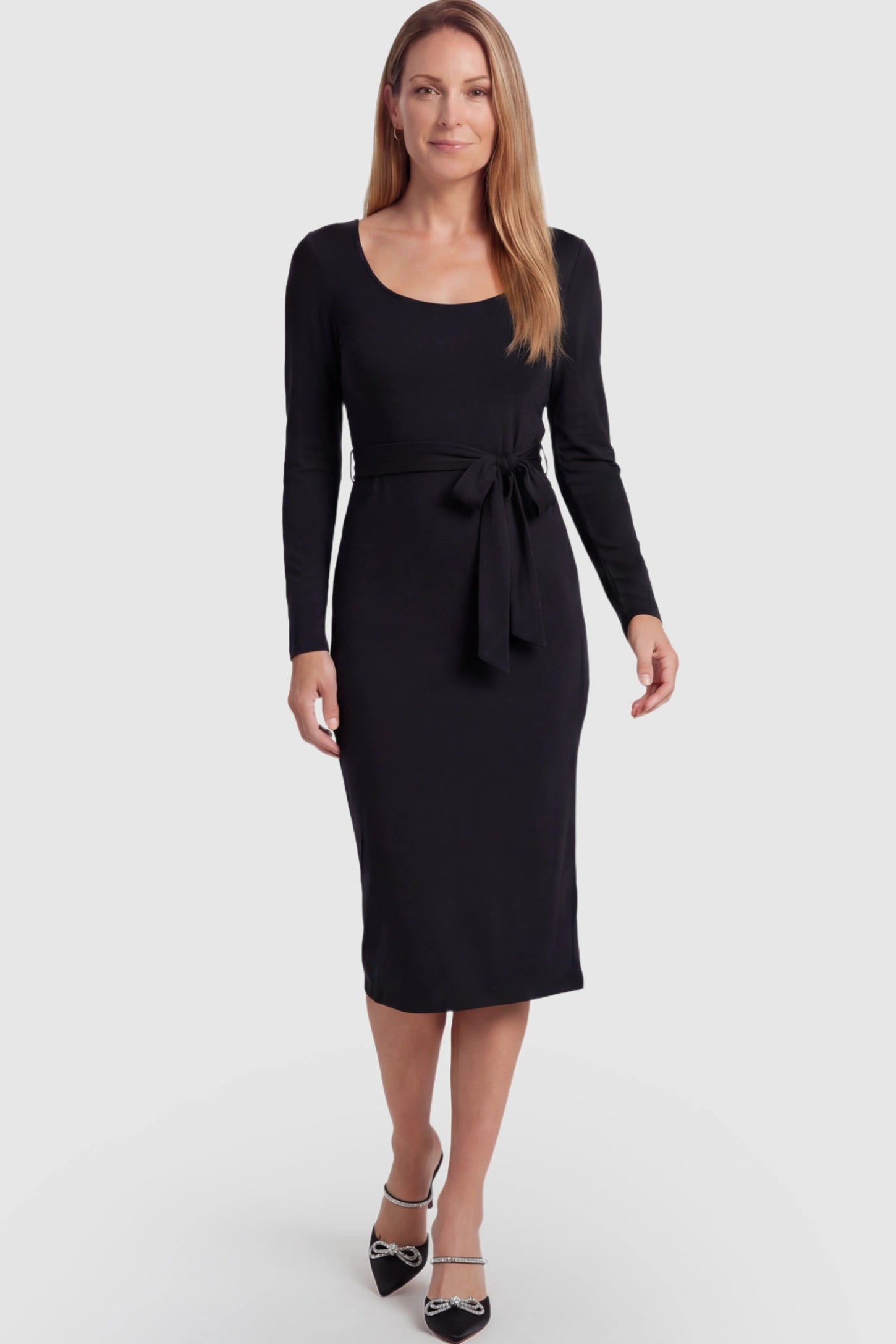 Square Neck Side-Tie Maternity Midi Dress Square Neck Side-Tie Maternity Midi Dress in Black featuring a long-sleeve bodycon fit on a postpartum model.