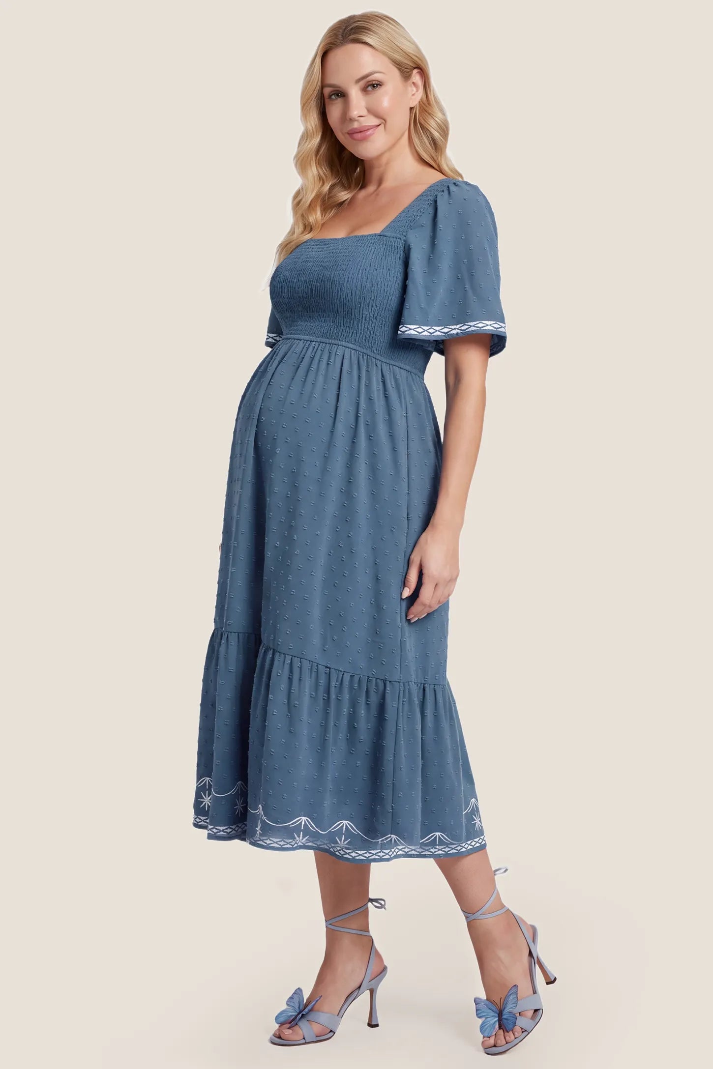 Square Neck Swiss Dot Maternity Dress Square Neck Swiss Dot Maternity Dress in Seasalt Dobby showcasing the comfortable flowing maternity fit, side view on a pregnant model.
