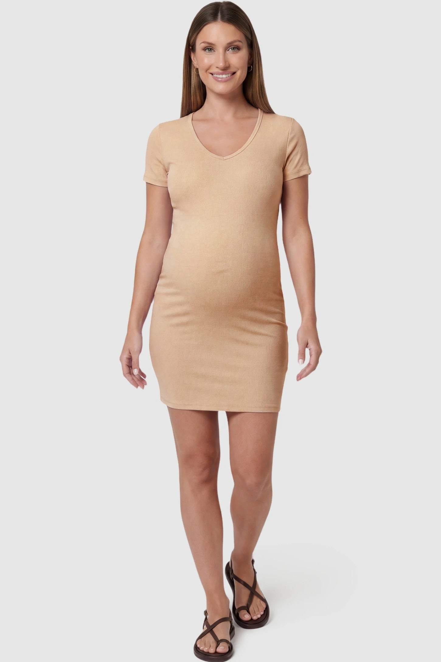 Stretchy Ribbed Short Sleeve Maternity Bodycon Dress Front (Pregnant): Stretchy Ribbed Short Sleeve Maternity Bodycon Dress in Khaki featuring a form-fitting ribbed fabric on a pregnant model, front view.