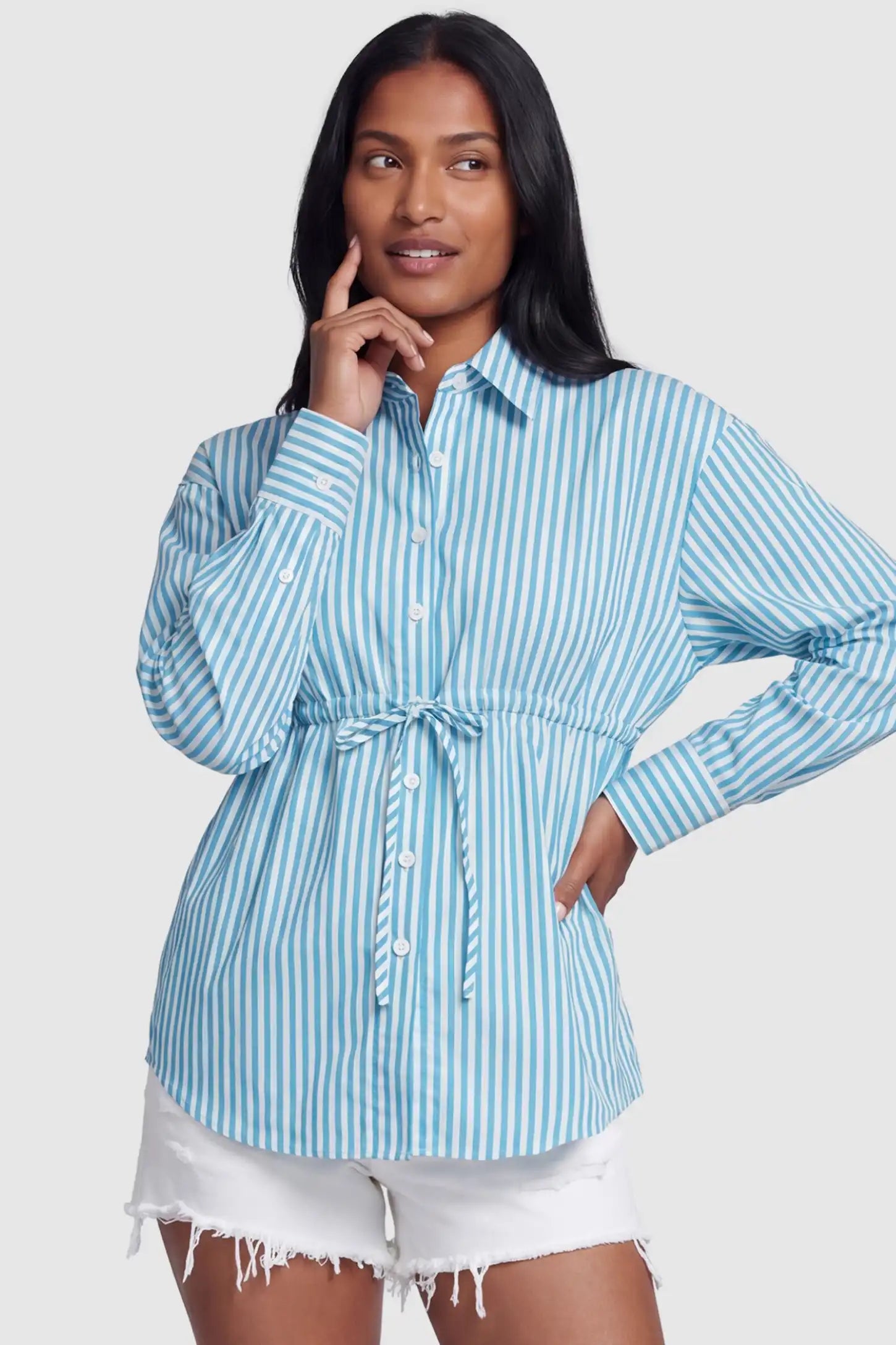 Striped Button Down Collared Neck Maternity Top Striped Button Down Collared Neck Maternity Top in Blue featuring a mid-waist adjustable drawstring on a postpartum model, front view.