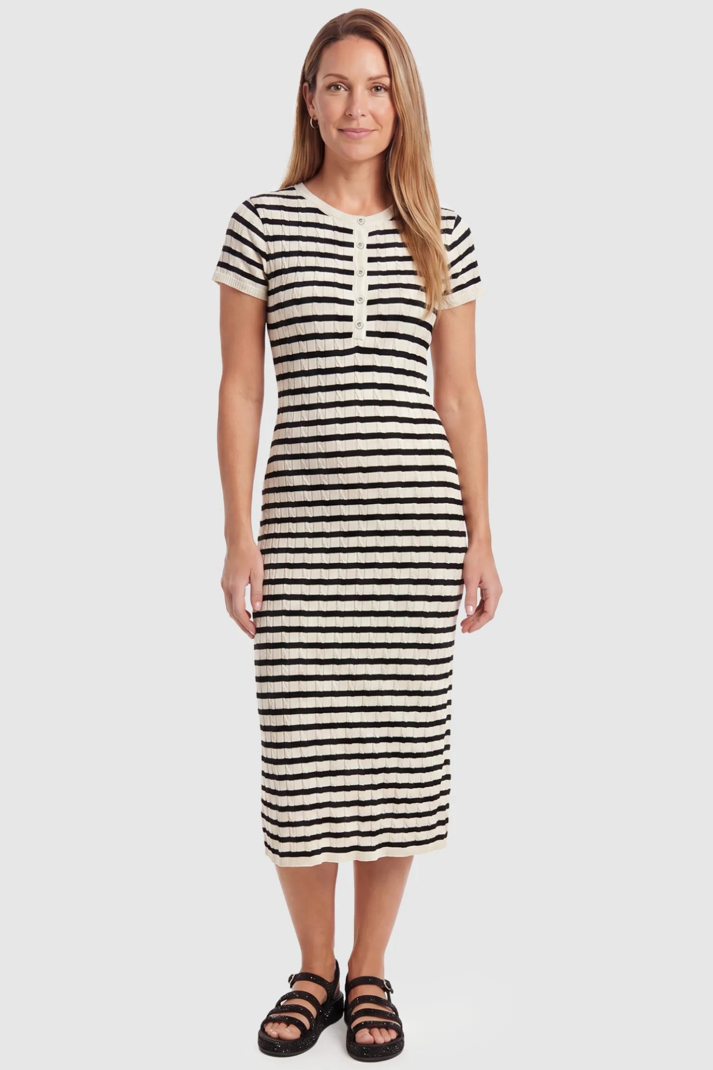 Striped Button Front Short Sleeve Maternity Midi Dress Striped Button Front Short Sleeve Maternity Midi Dress in black stripe featuring short sleeves and a round neck on a postpartum model, front view.