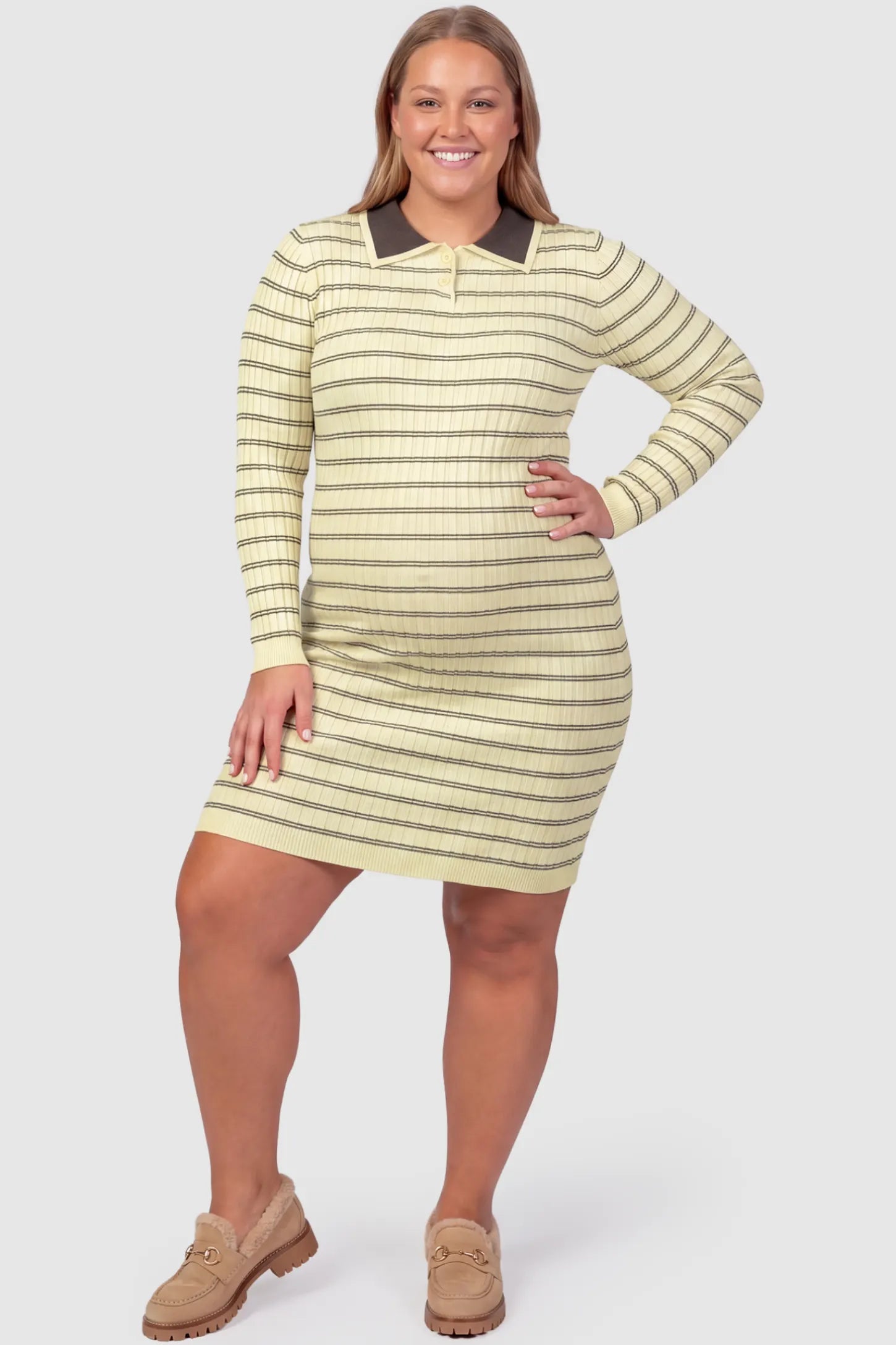Striped Knit Collared Maternity Midi Dress Rib-Knit Straight-Tube Maternity Midi in Off-White Stripes featuring a contrast polo collar on a plus size pregnant model, front view.
