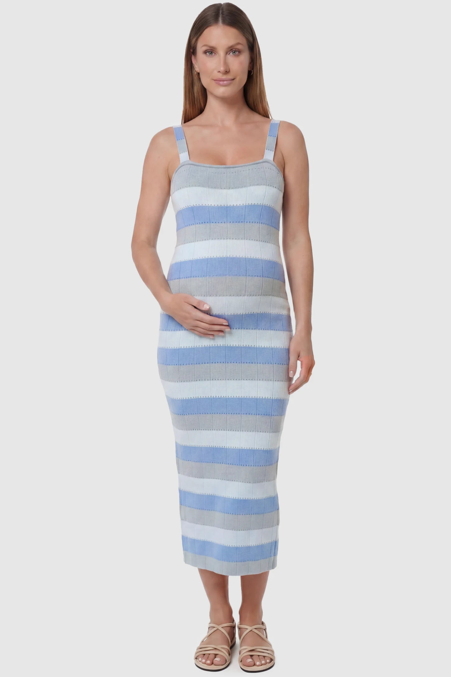 Striped Square Neck Sleeveless Maternity Midi Dress Striped Square Neck Sleeveless Maternity Midi Dress in Blue featuring adjustable slider straps and soft knit stretch on a pregnant model, front view.