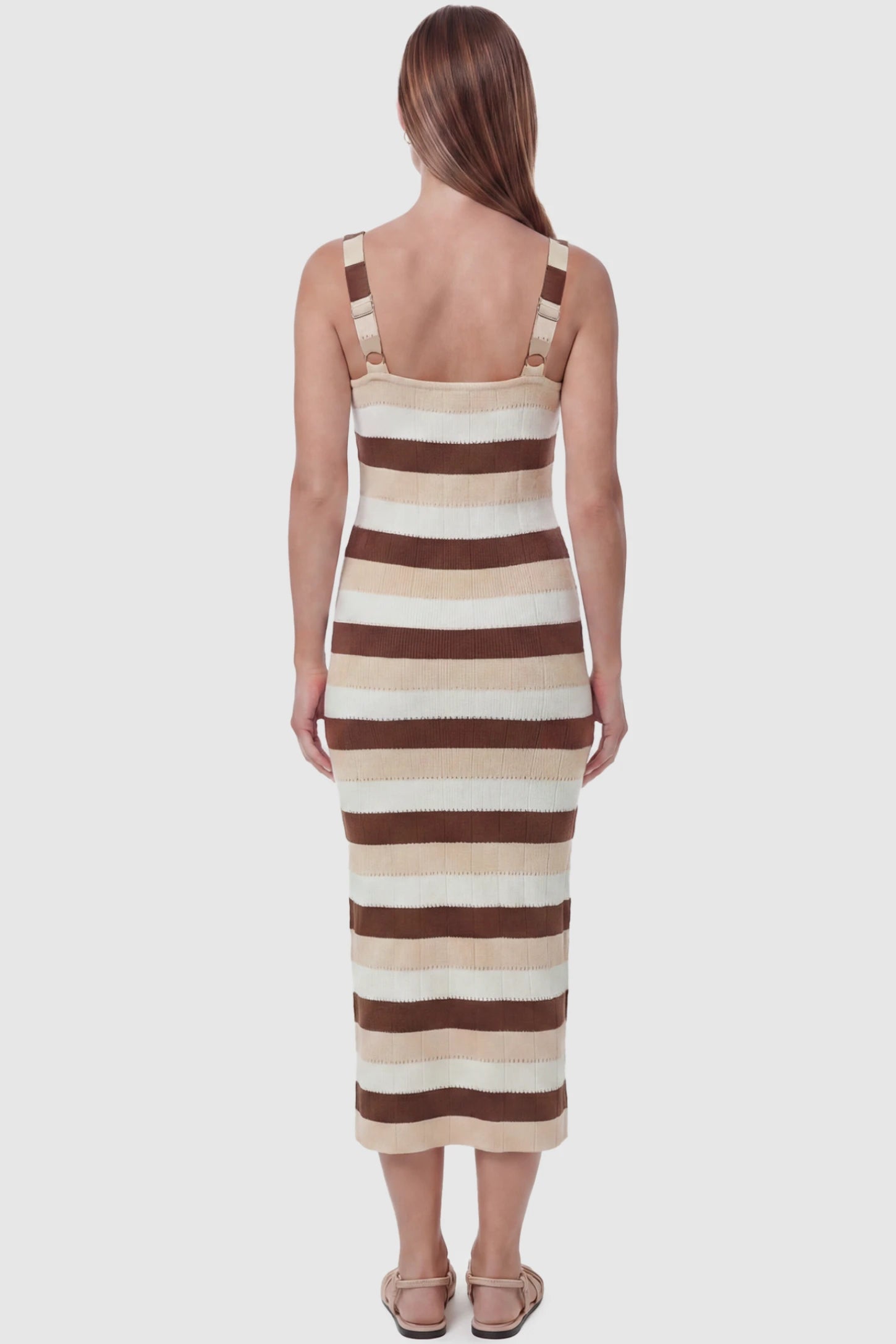 Striped Square Neck Sleeveless Maternity Midi Dress Striped Square Neck Sleeveless Maternity Midi Dress in Brown featuring adjustable slider straps and soft knit stretch on a pregnant model, back view.