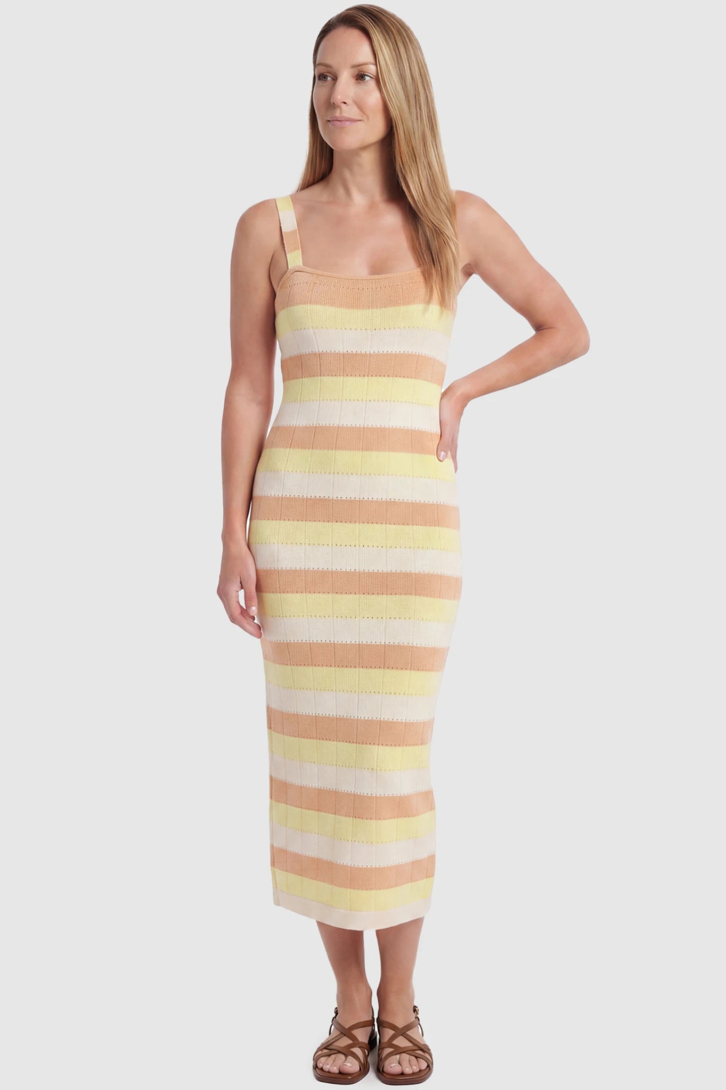 Striped Square Neck Sleeveless Maternity Midi Dress Striped Square Neck Sleeveless Maternity Midi Dress in Yellow featuring adjustable slider straps and soft knit stretch on a postpartum model, front view.