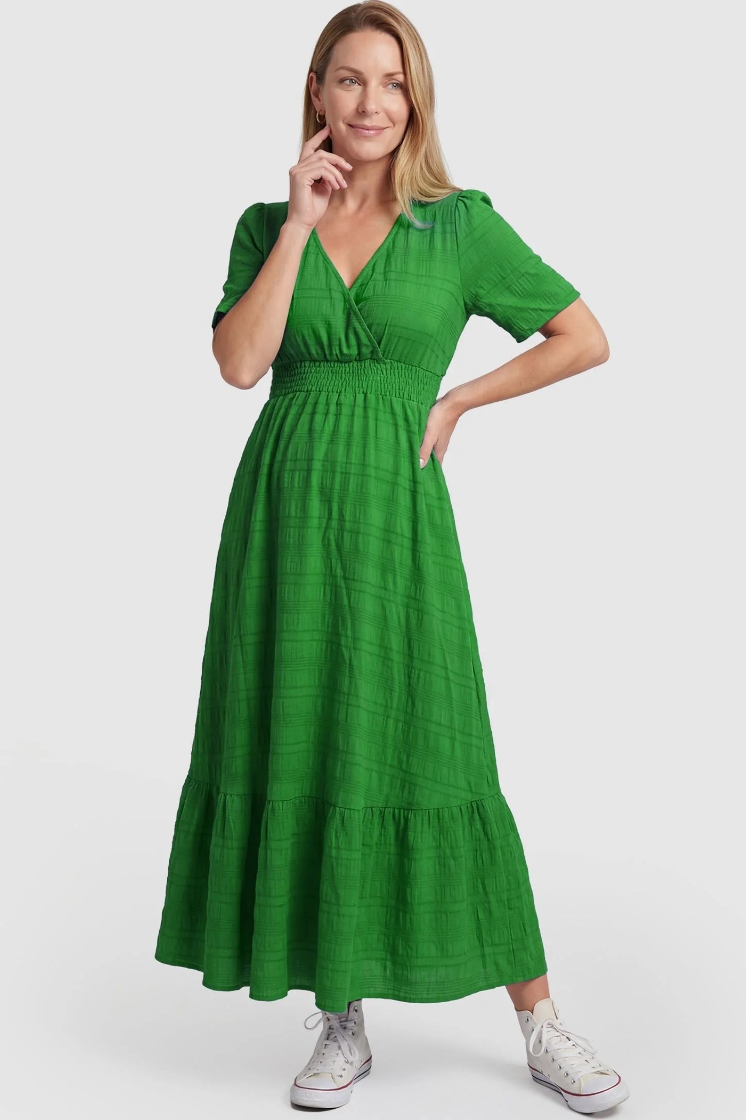 Textured Knit Butterfly Sleeve Maternity Midi Dress Textured Knit Butterfly Sleeve Midi Dress in Green featuring feminine short butterfly sleeves on a non-pregnant model, postpartum front view.