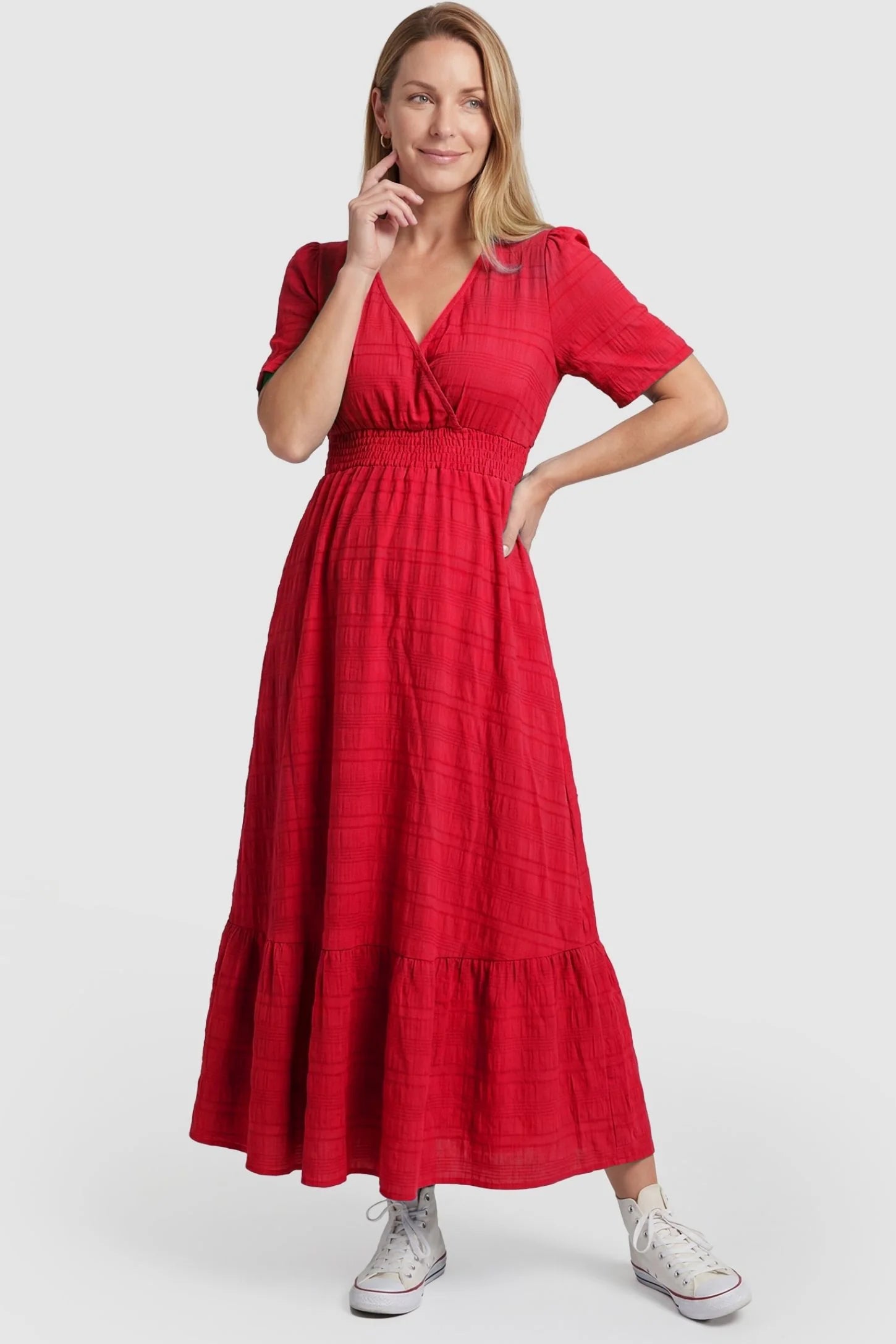 Textured Knit Butterfly Sleeve Maternity Midi Dress Textured Knit Butterfly Sleeve Midi Dress in Red featuring feminine short butterfly sleeves on a non-pregnant model, postpartum front view.