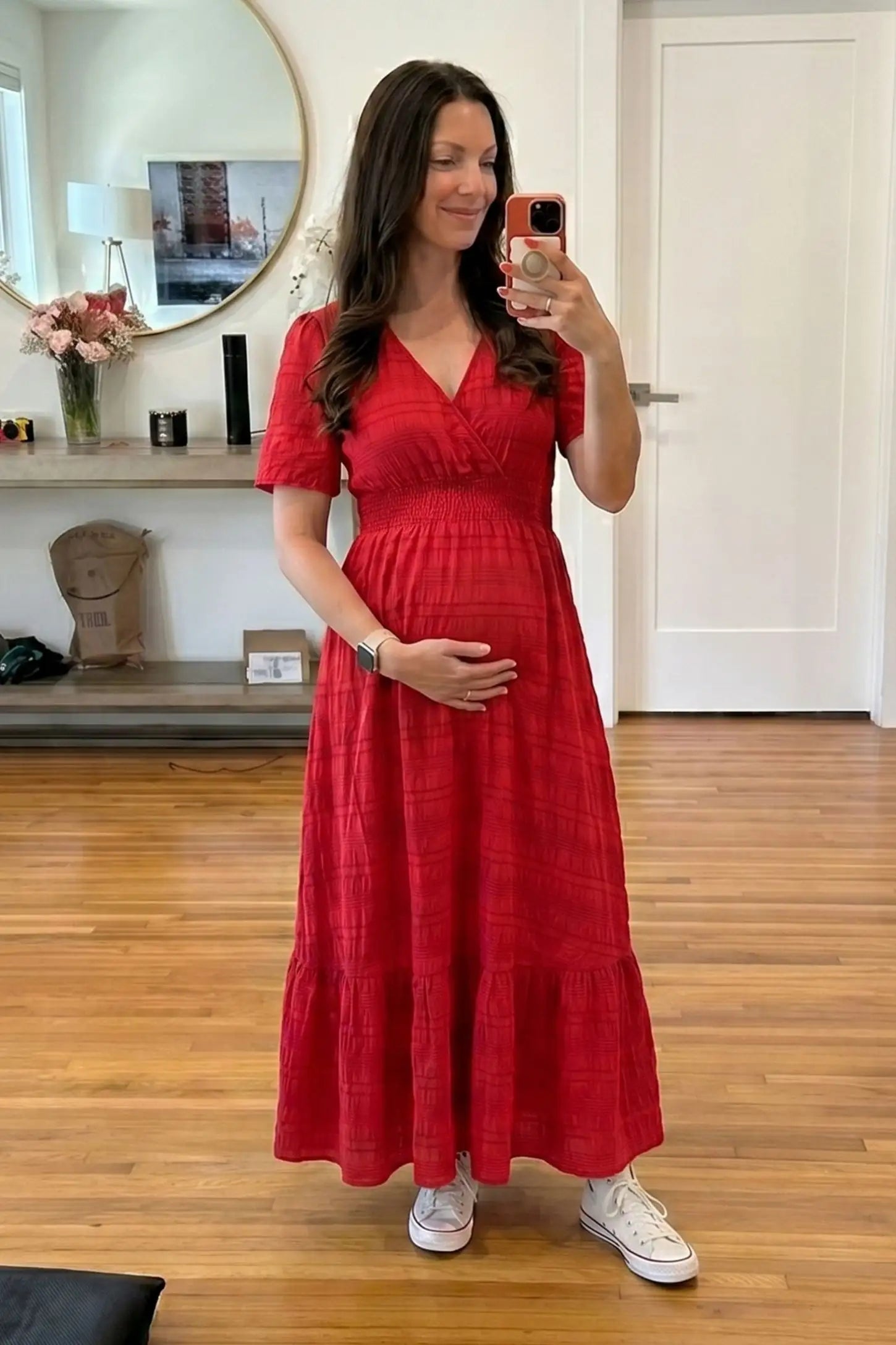 Textured Knit Butterfly Sleeve Maternity Midi Dress Textured Knit Butterfly Sleeve Midi Dress in Red featuring feminine short butterfly sleeves on a pregnant model, UGC view.