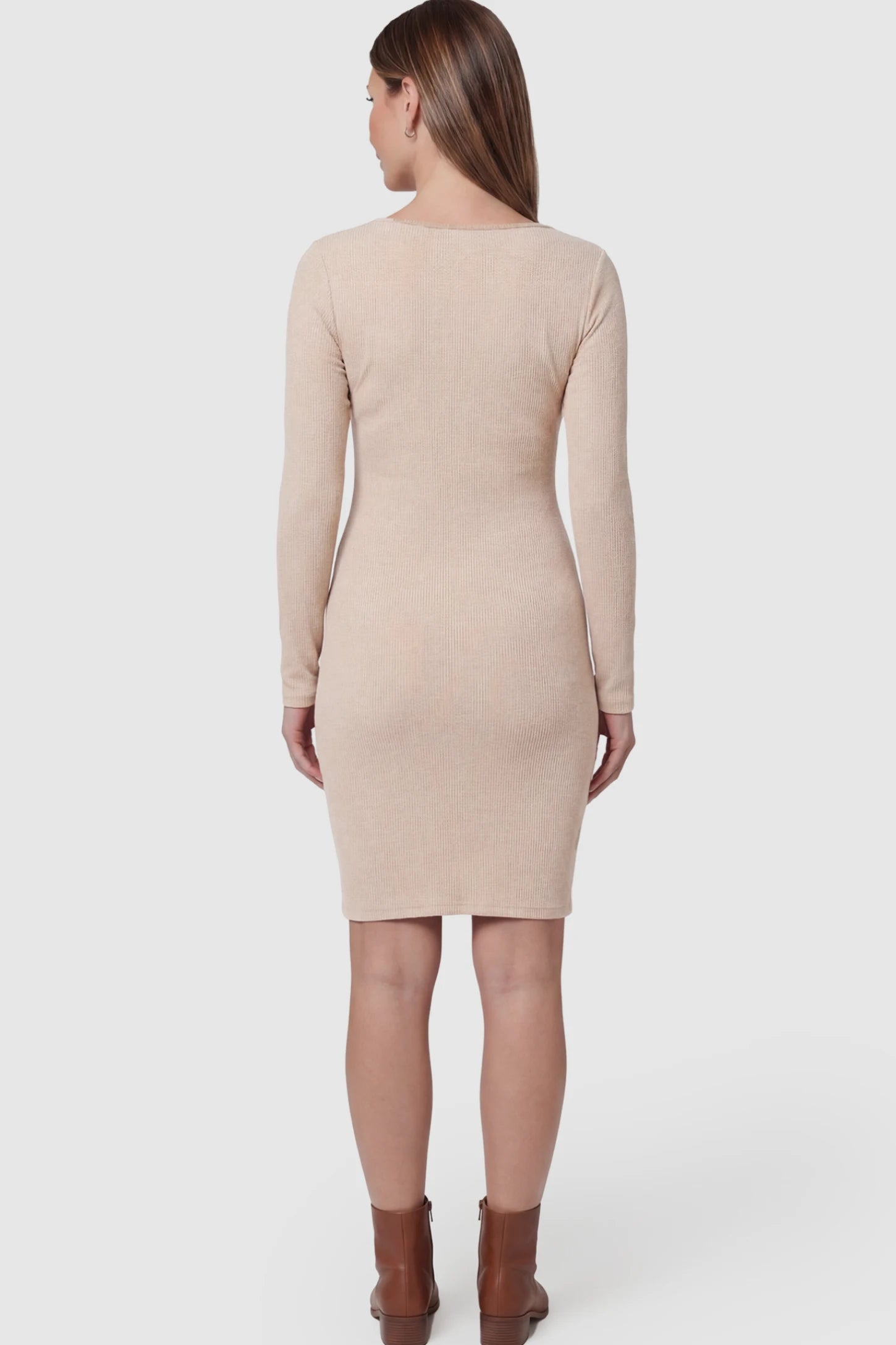 Tie-Waist Long Sleeve V-Neck Maternity Midi Dress Long Sleeve Maternity Midi Dress in Beige featuring a smooth jersey back and figure-hugging fit on a pregnant model.