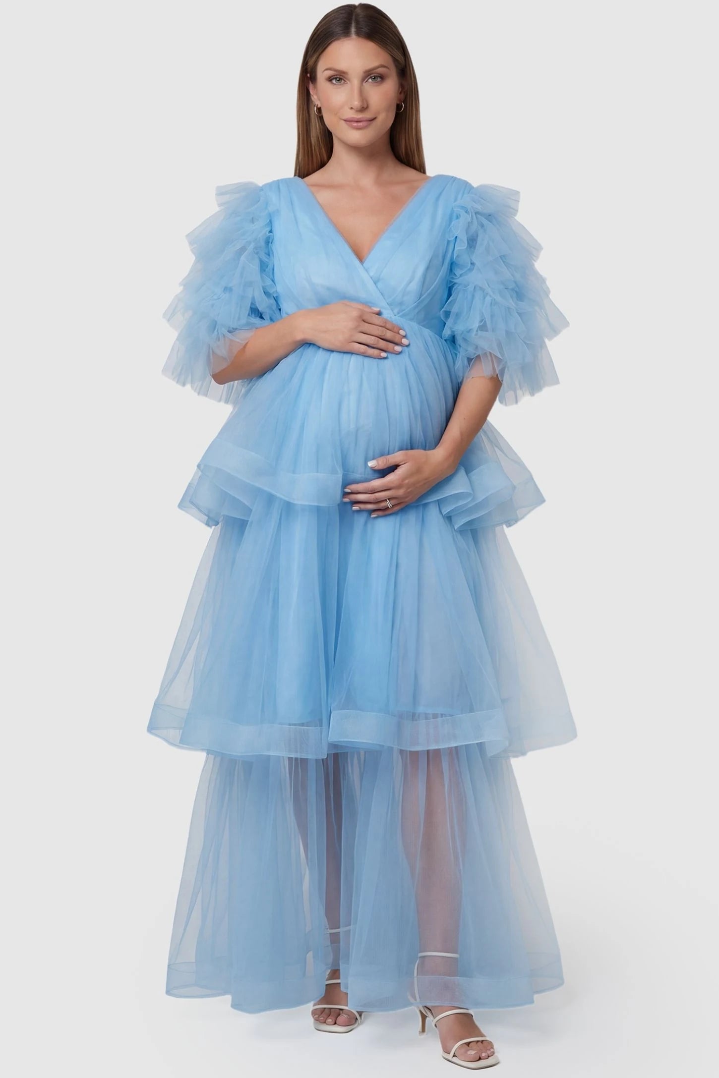 Tiered Ruffled Tulle Flutter Sleeve Maternity Maxi Gown in Blue featuring a tiered skirt on a front-facing pregnant model.