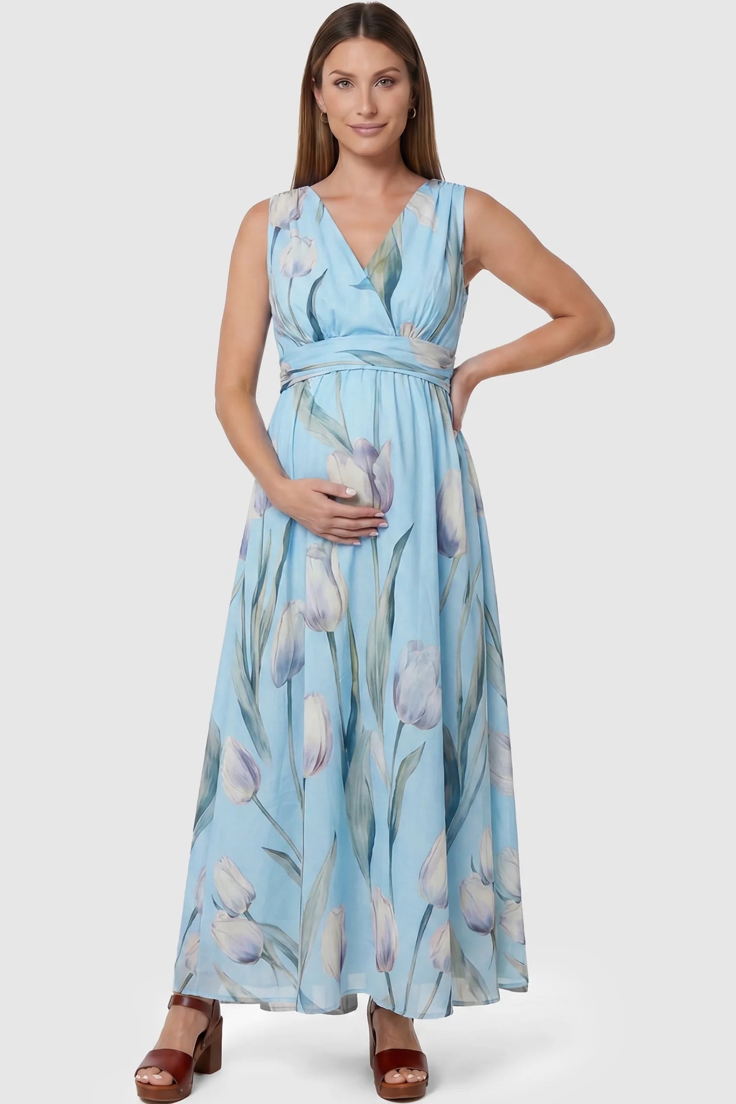 Tulip Print V-Neck Maxi Dress in Blue featuring a watercolor tulip print on a pregnant model, front view.