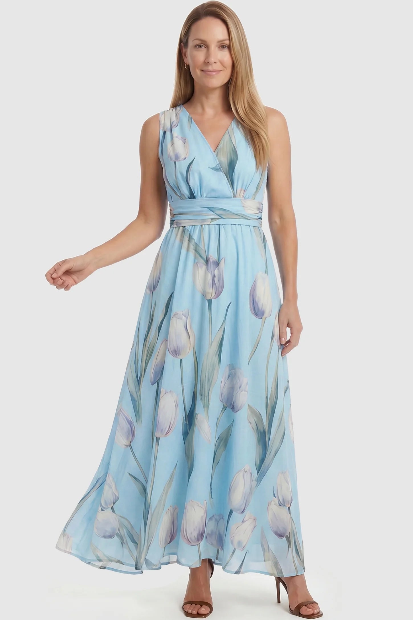 Tulip Print V-Neck Maxi Dress Tulip Print V-Neck Maxi Dress in Blue featuring a watercolor tulip print on a non-pregnant model, front view.