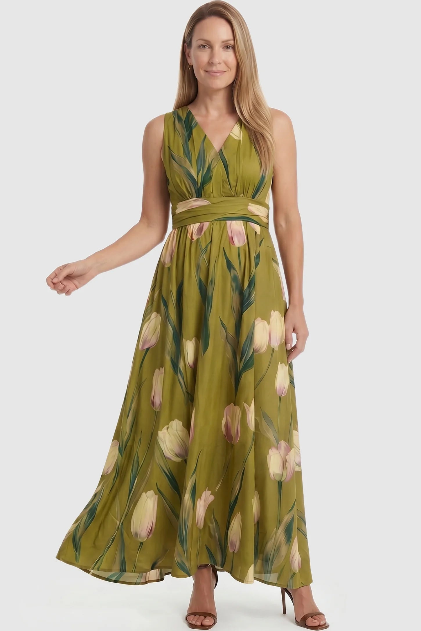 Tulip Print V-Neck Maxi Dress Tulip Print V-Neck Maxi Dress in Green featuring a bold botanical tulip print on a non-pregnant model, front view.