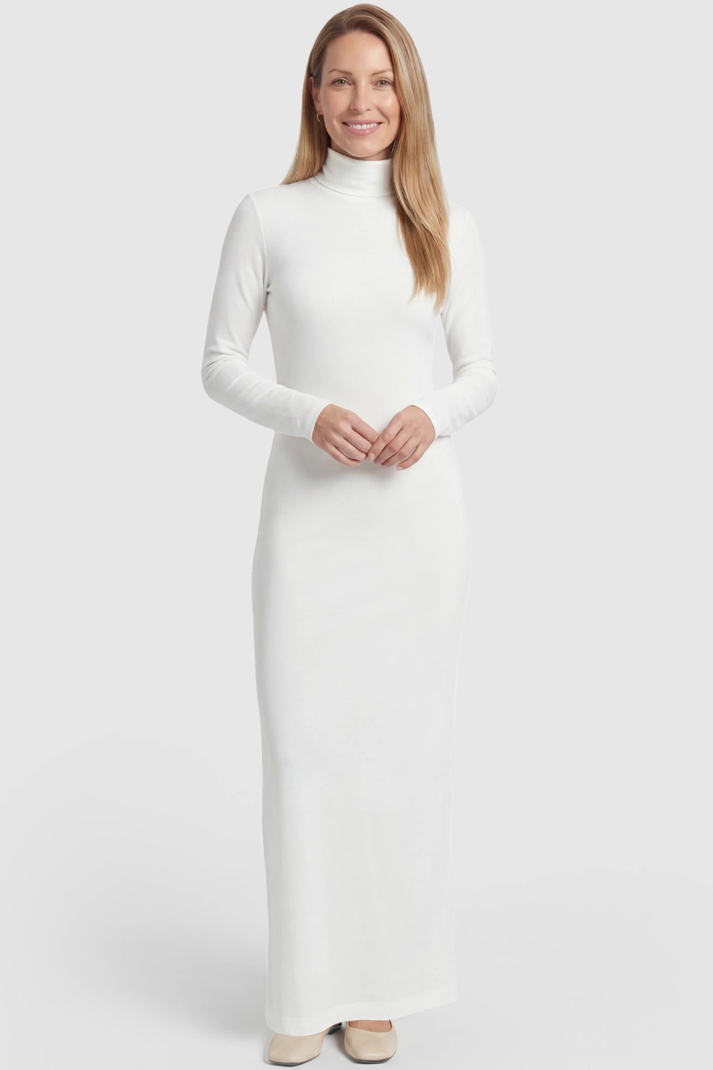 Turtle Neck Long Sleeve Maternity Maxi Dress Turtle Neck Long Sleeve Maternity Maxi Dress in White featuring a turtleneck and long sleeves on a postpartum model, front view.